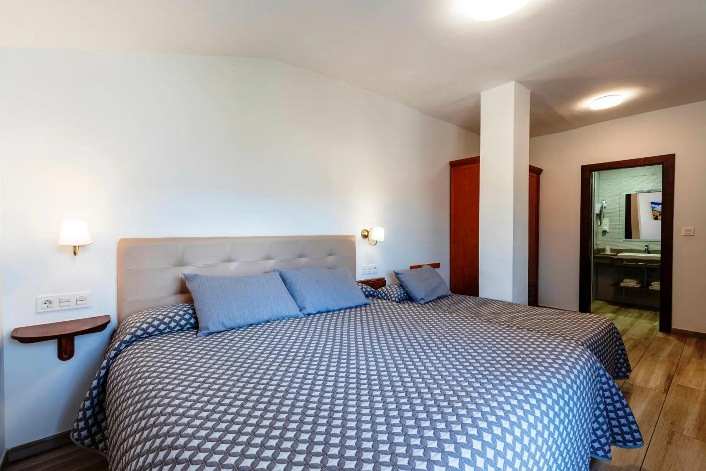 Bed in Hostal y Apartamento Rural Los Naranjos