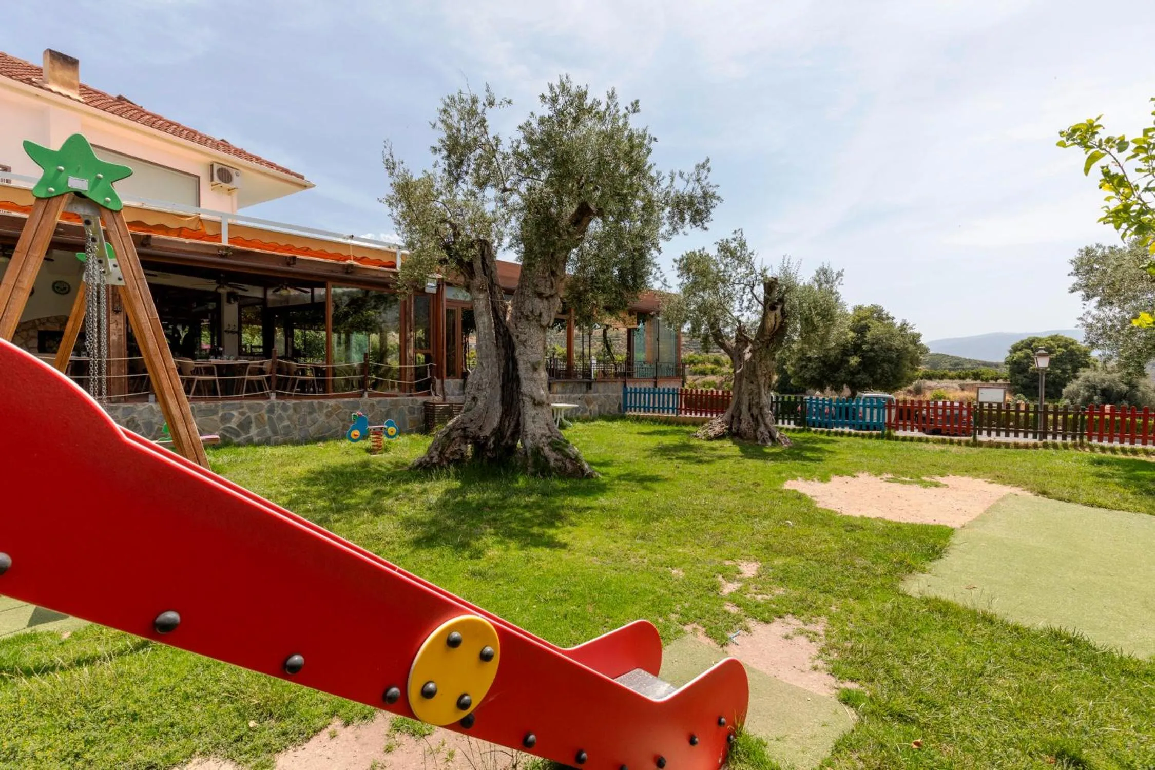 Children play ground in Hostal y Apartamento Rural Los Naranjos