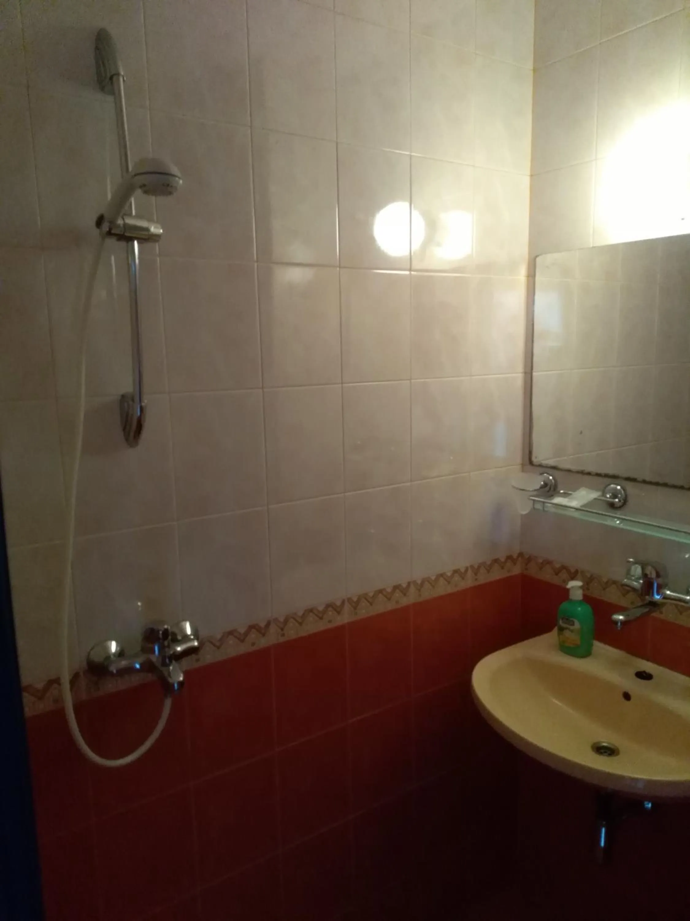 Shower in The Colourful Mansion Hotel