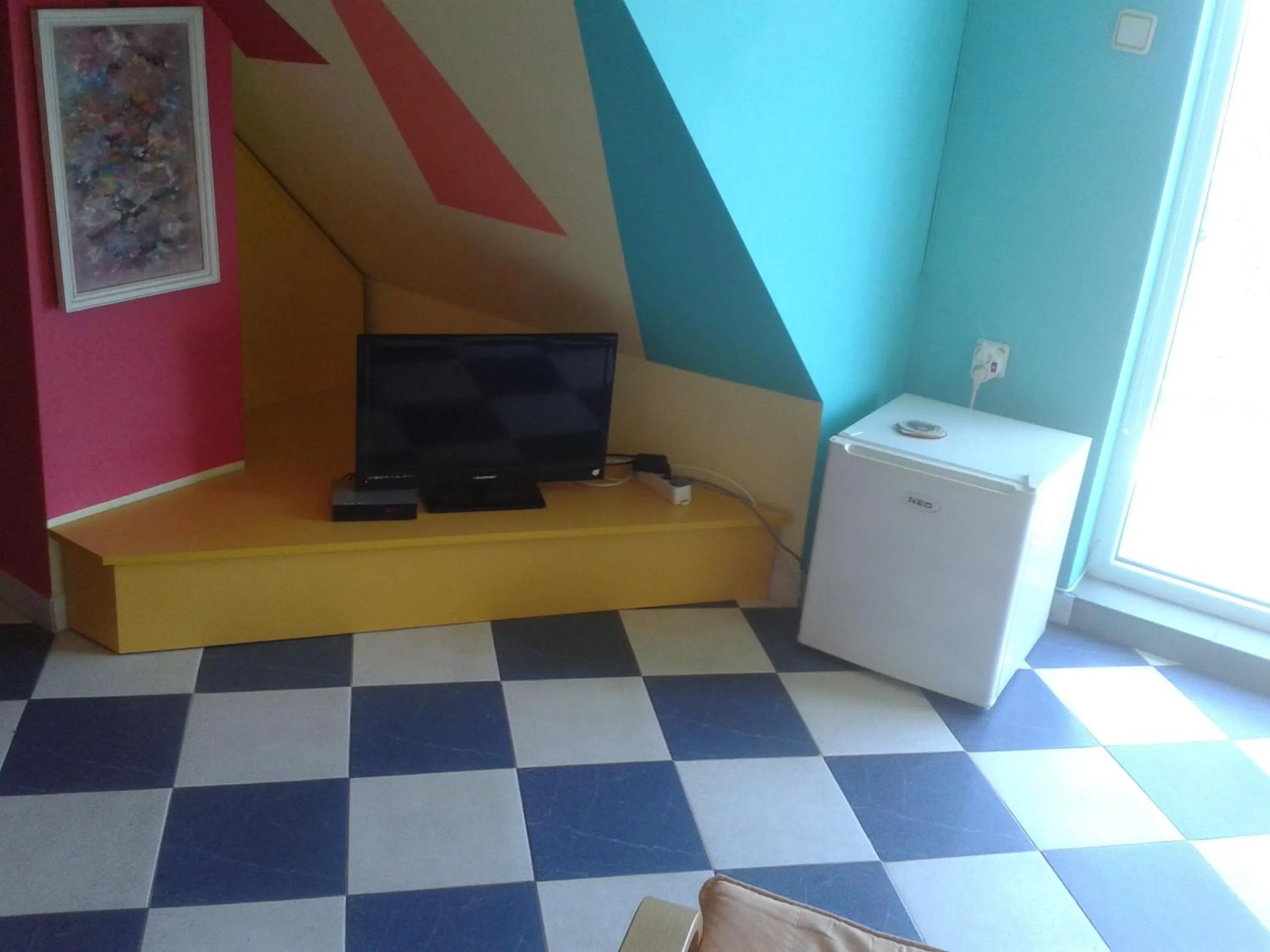 TV and multimedia in The Colourful Mansion Hotel