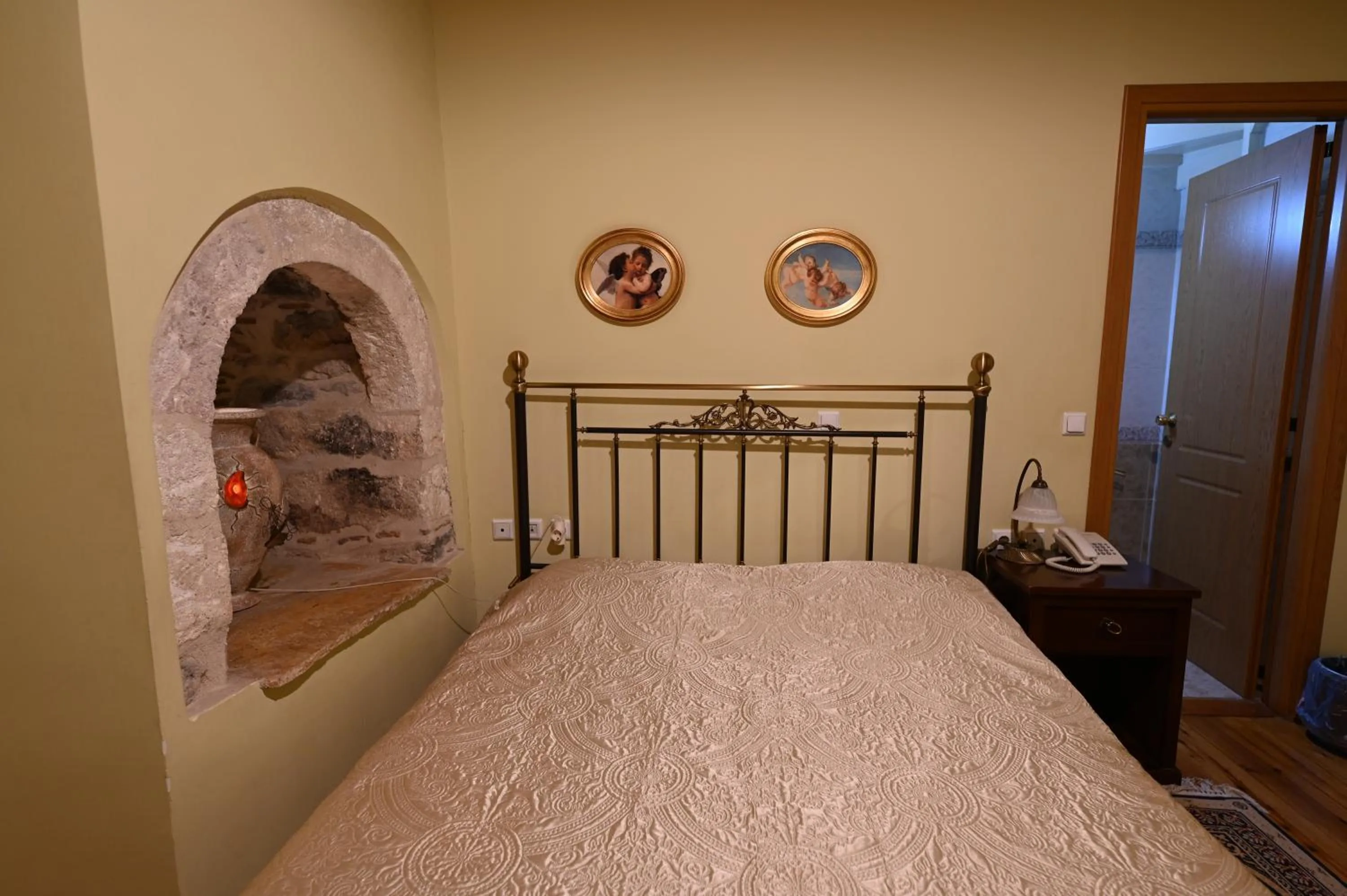 Bed in Polyxenia Hotel