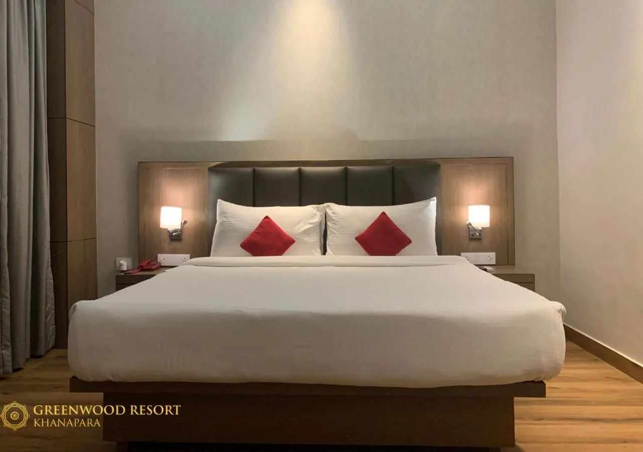Bed in The Greenwood Resort, Guwahati