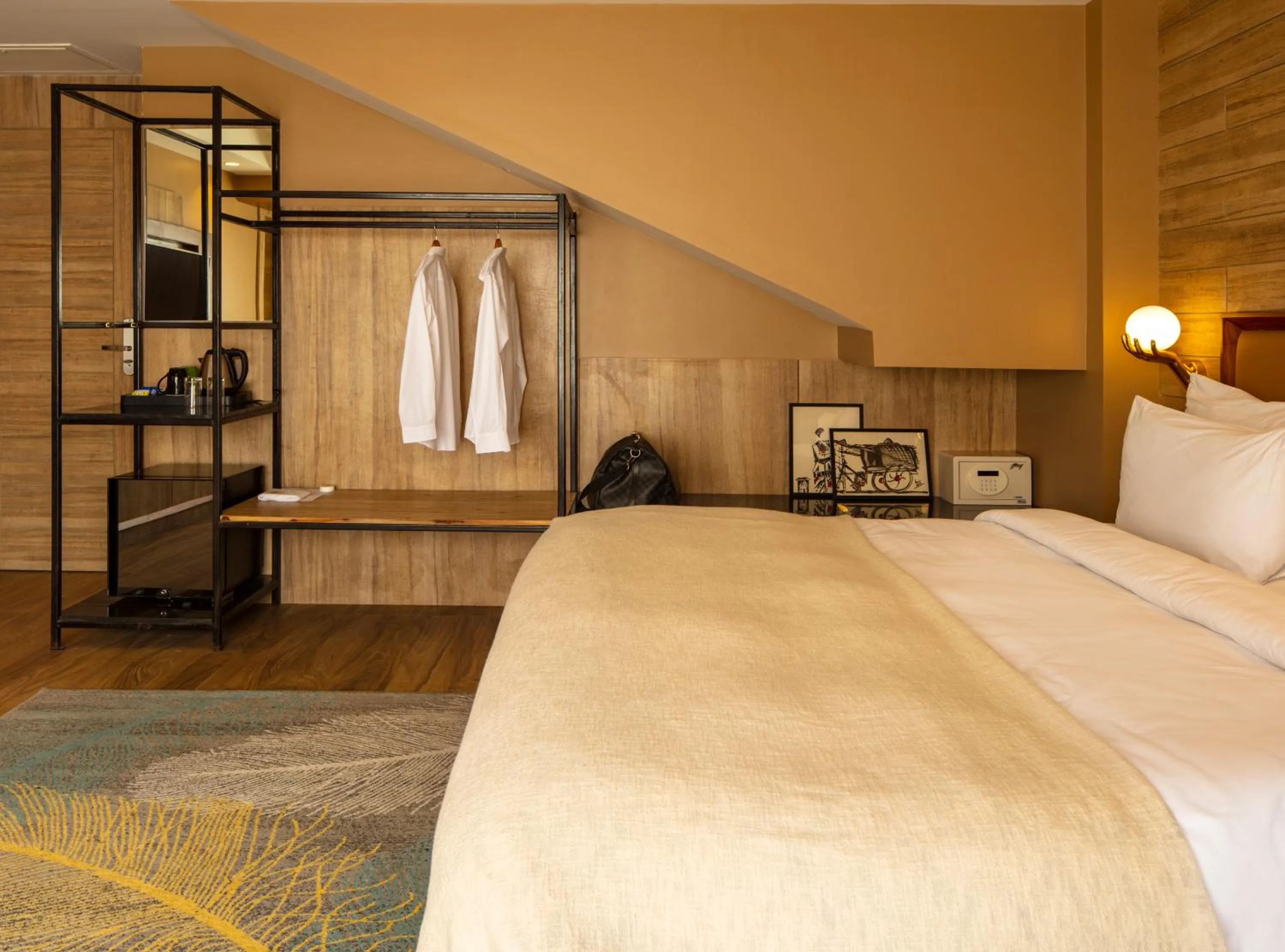 Bed in The Greenwood Resort, Guwahati