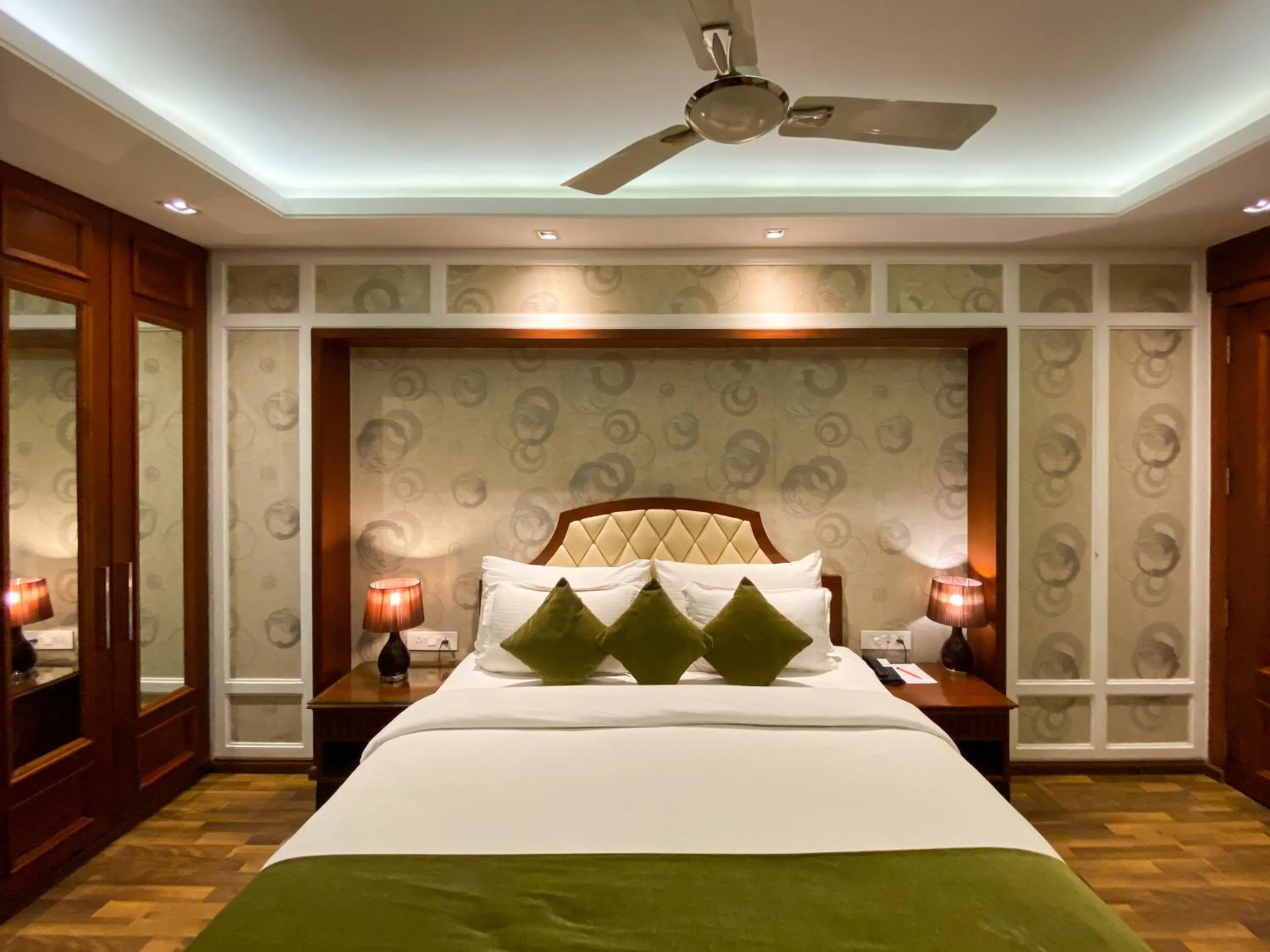 Bed in The Greenwood Resort, Guwahati
