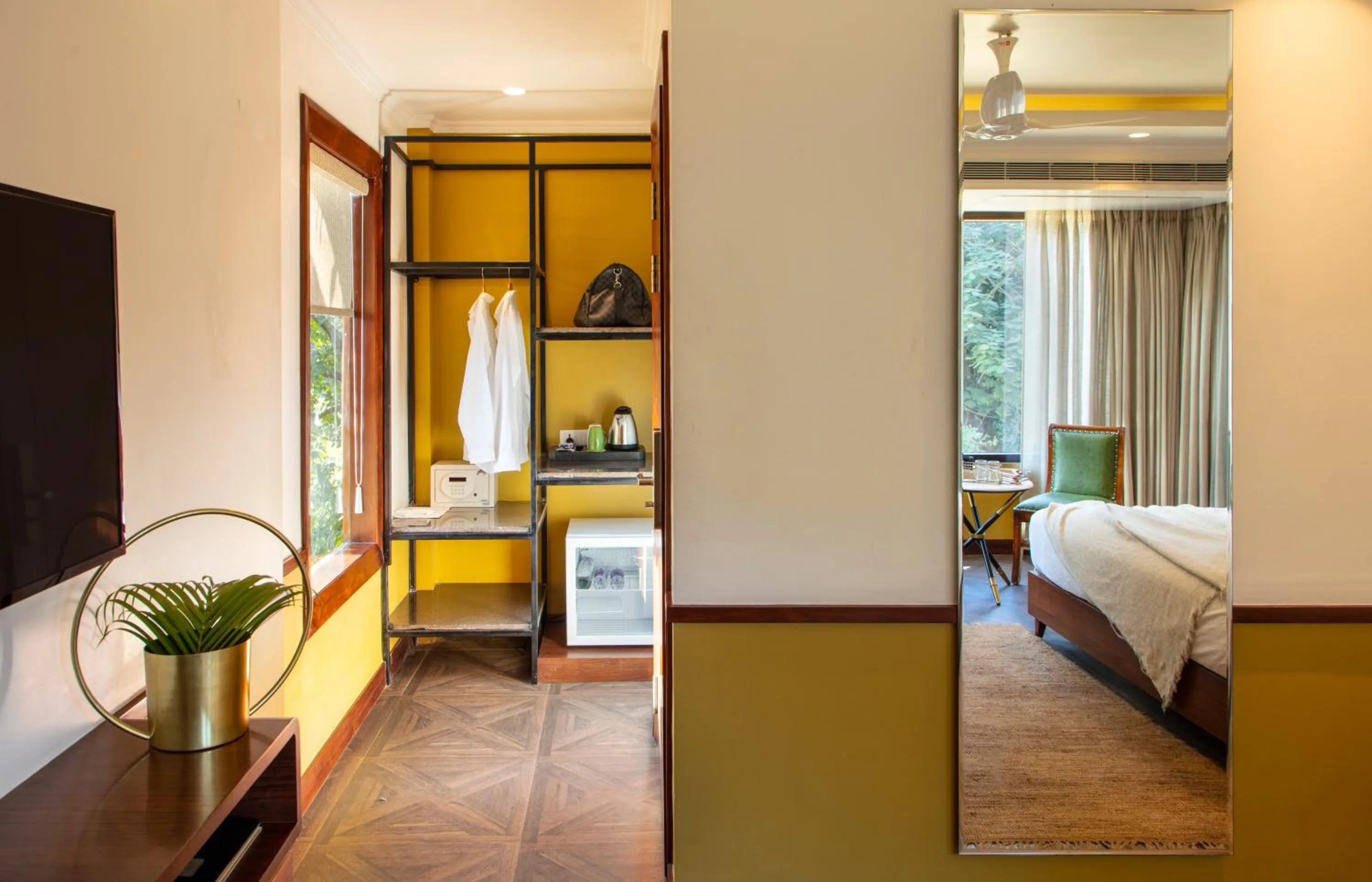 wardrobe, Bed in The Greenwood Resort, Guwahati