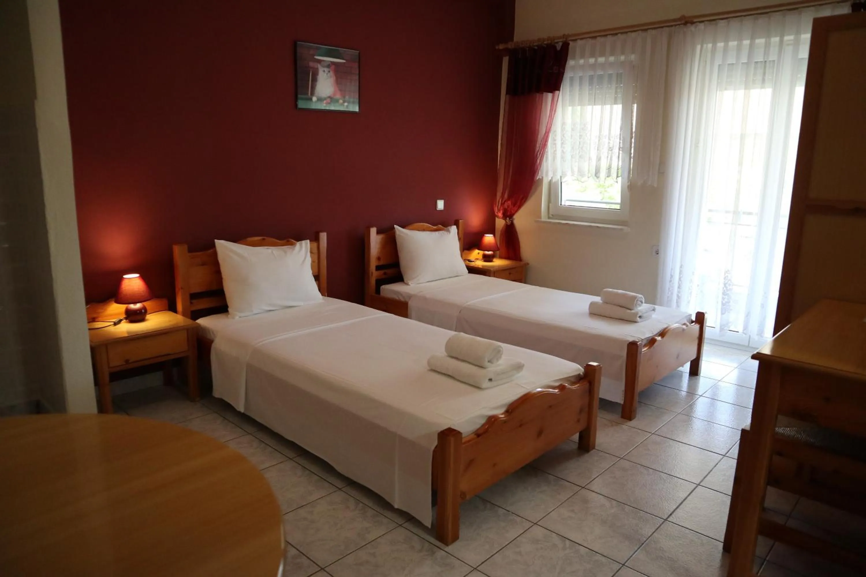 Bed in Delphin Rooms Sivota