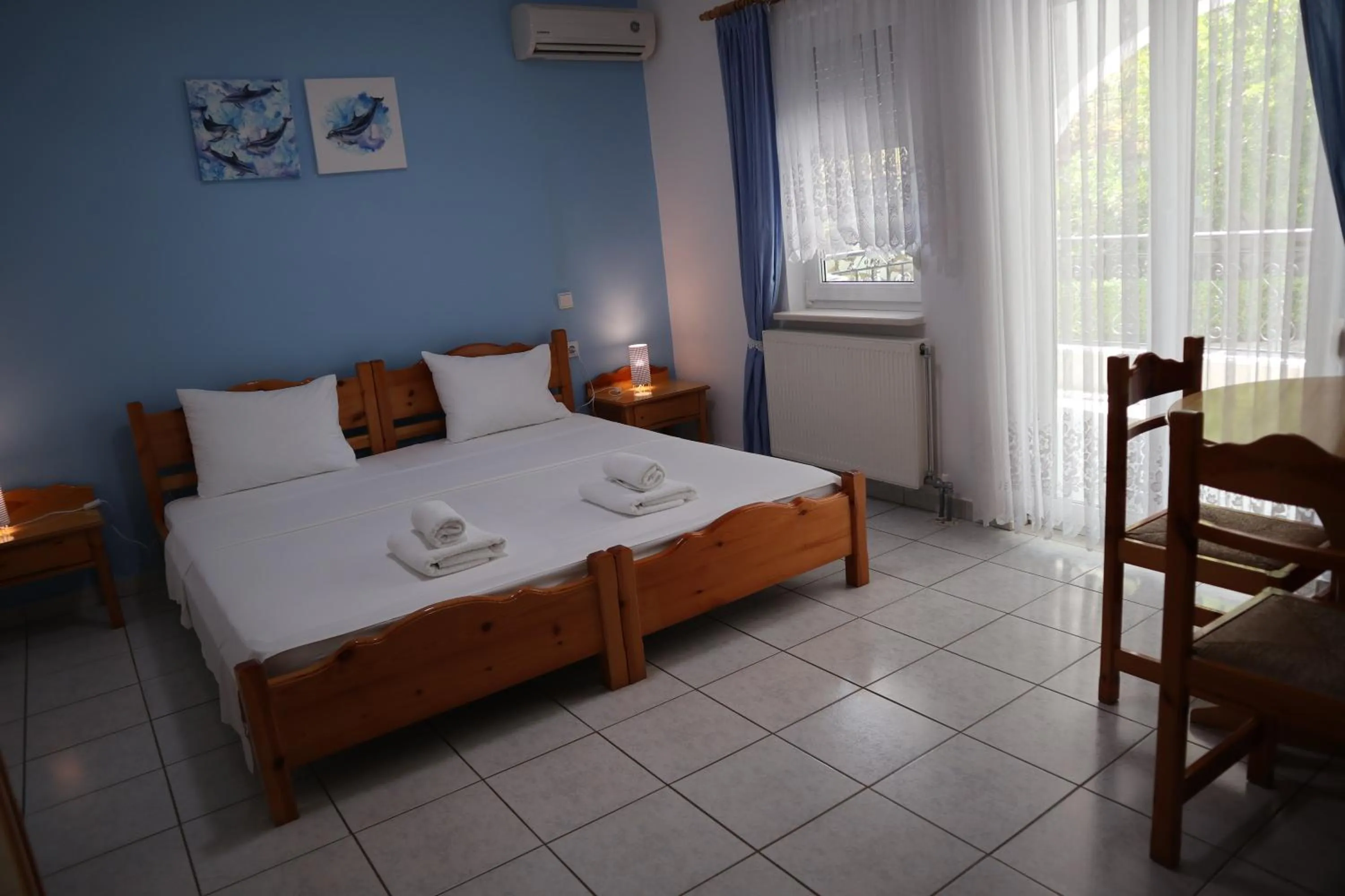 Bed in Delphin Rooms Sivota