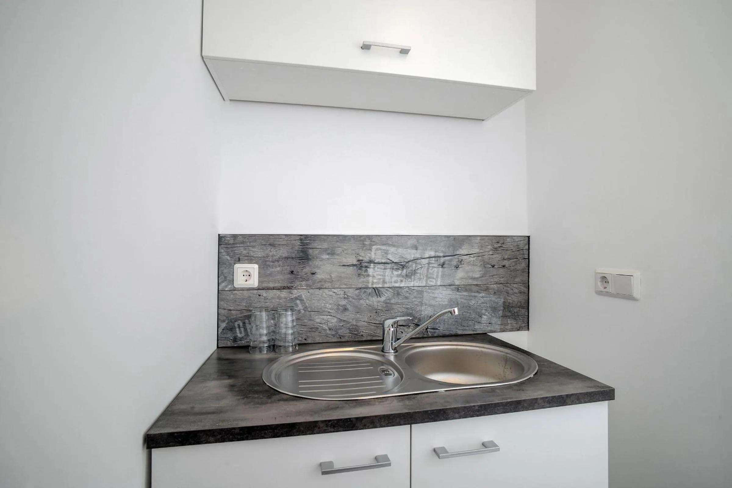 Kitchen or kitchenette in Designpension Traumschloss Hotel Garni