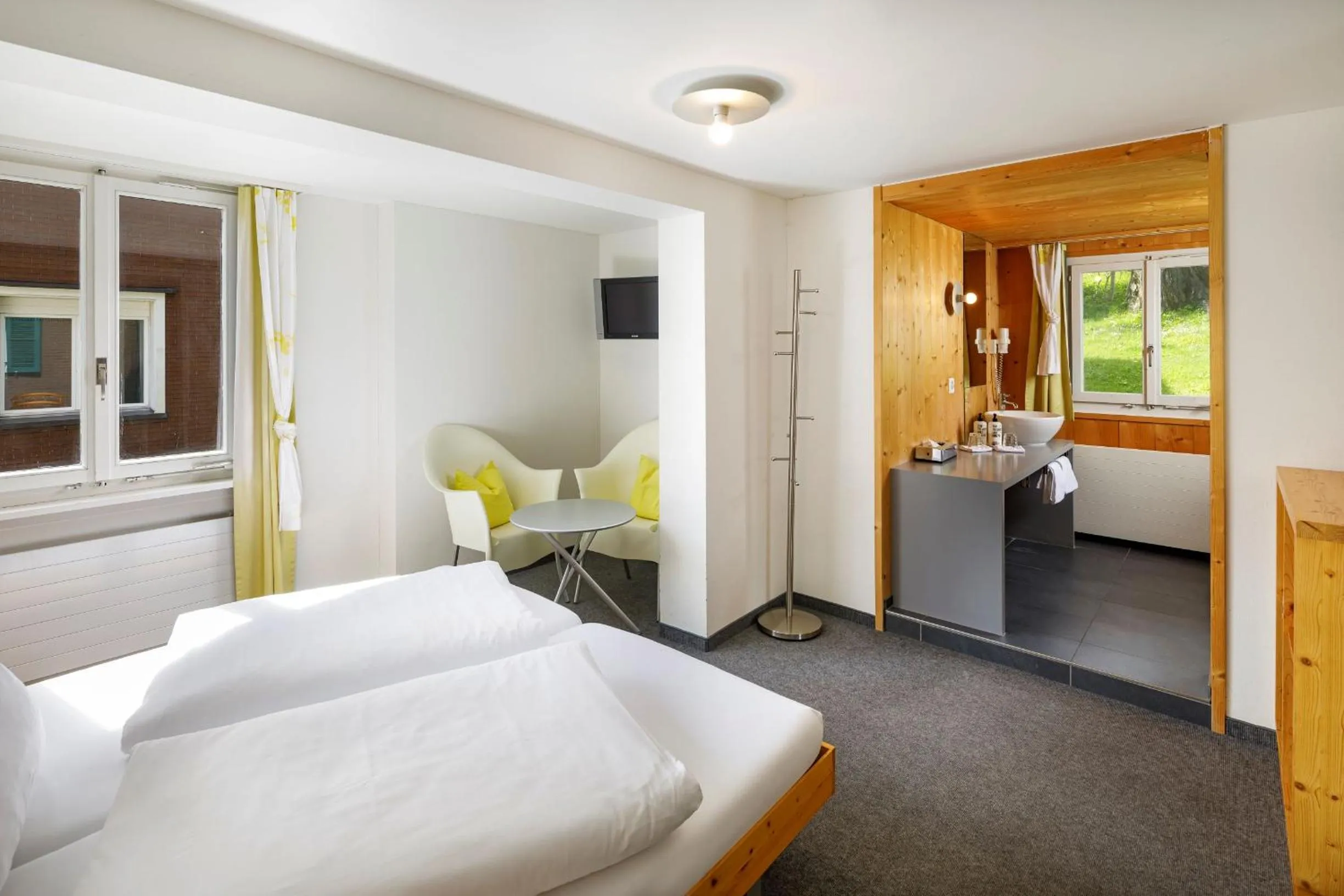 Photo of the whole room, Bed in Hirschen Guesthouse - Village Hotel