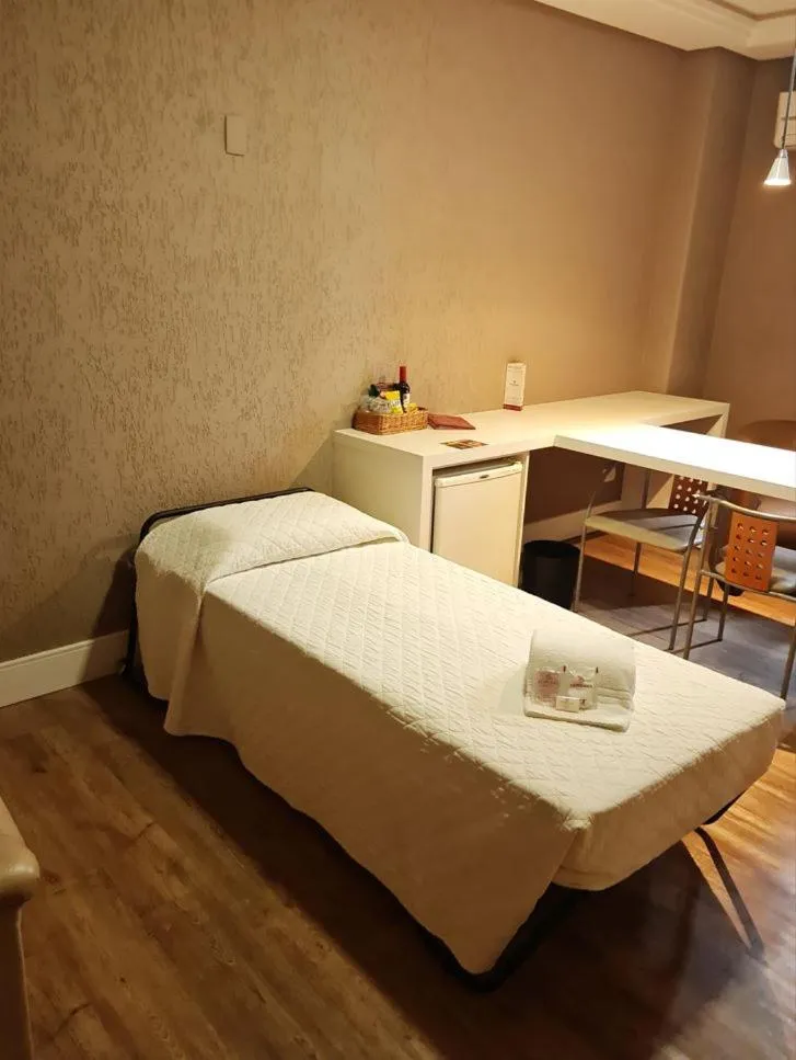 Bed in SJ Royal - San Juan Curitiba