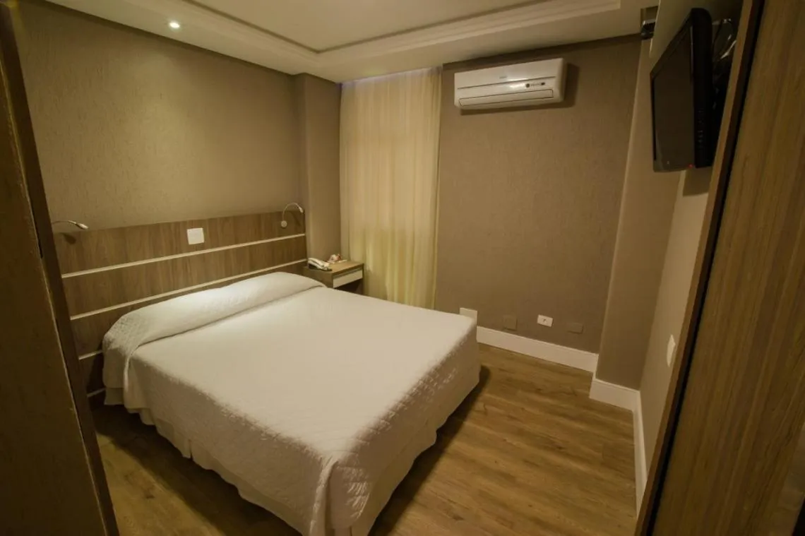 Bed in SJ Royal - San Juan Curitiba