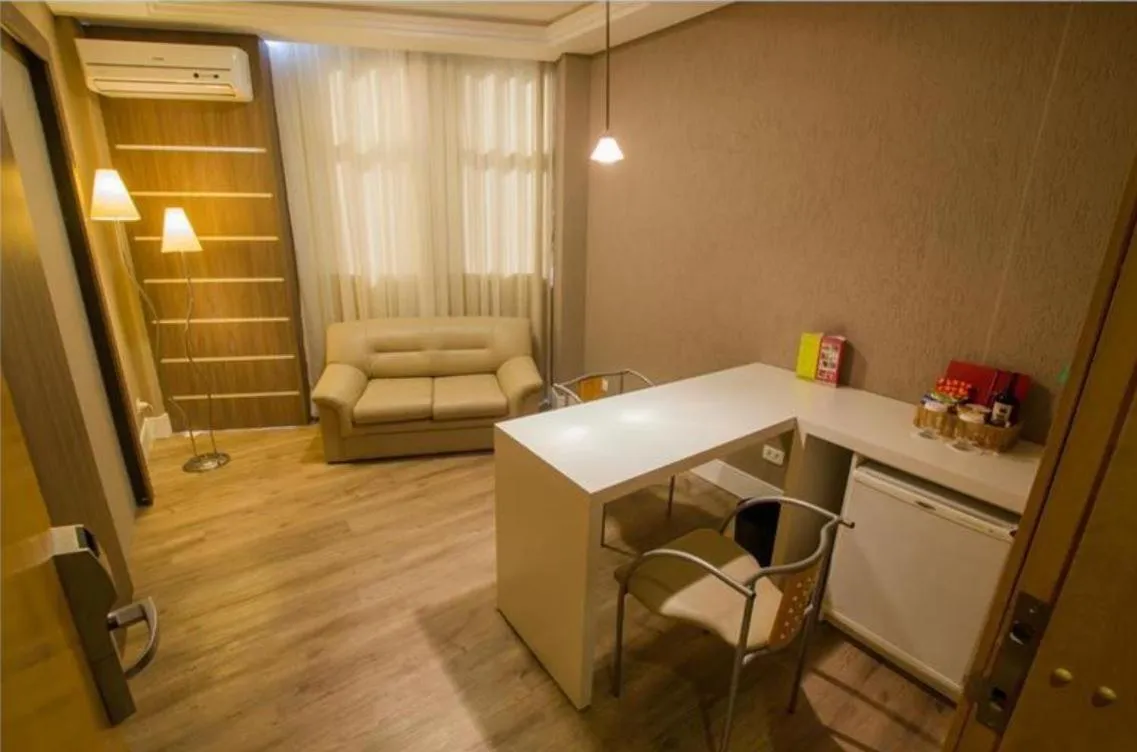 Living room in SJ Royal - San Juan Curitiba