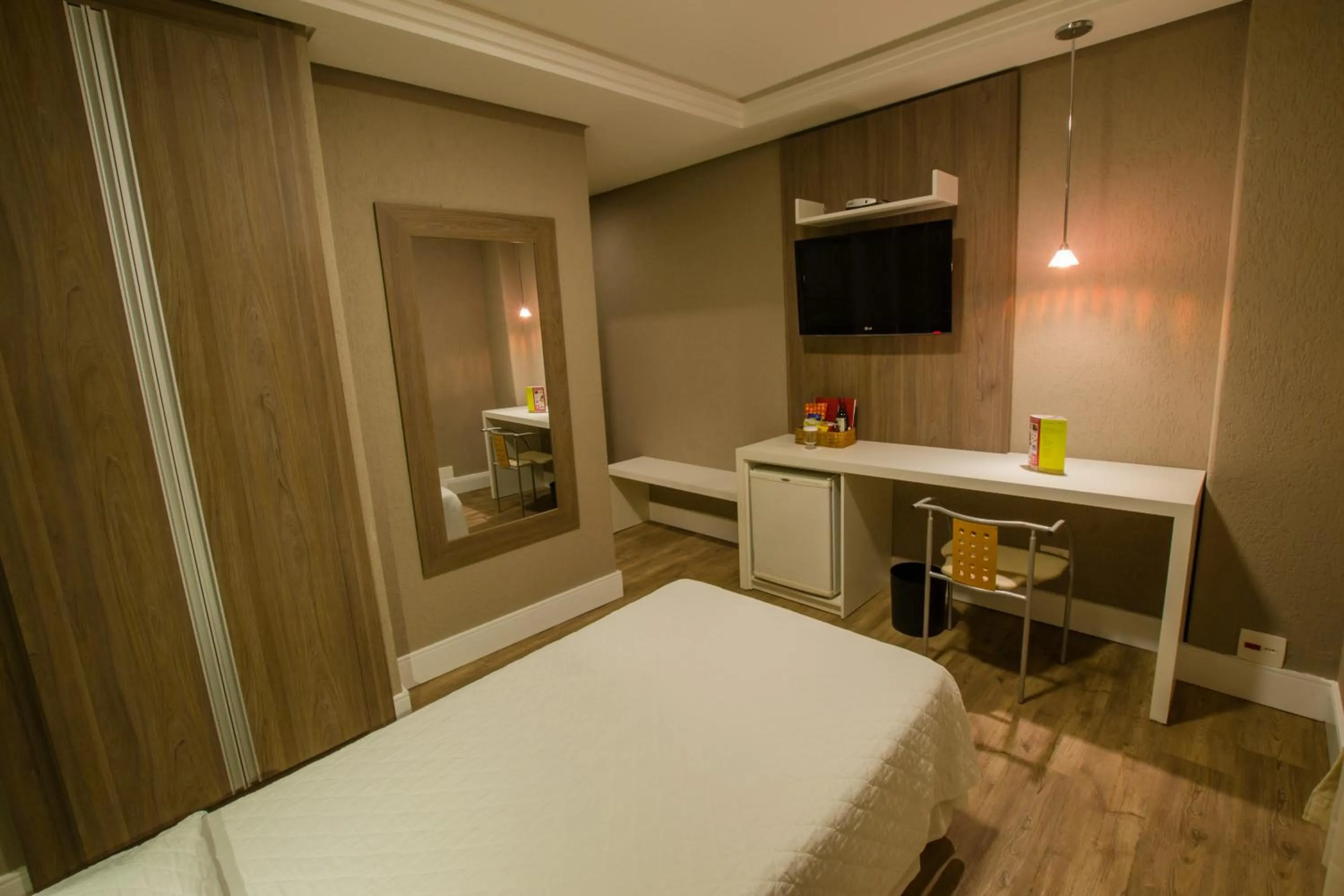 Bed in SJ Royal - San Juan Curitiba