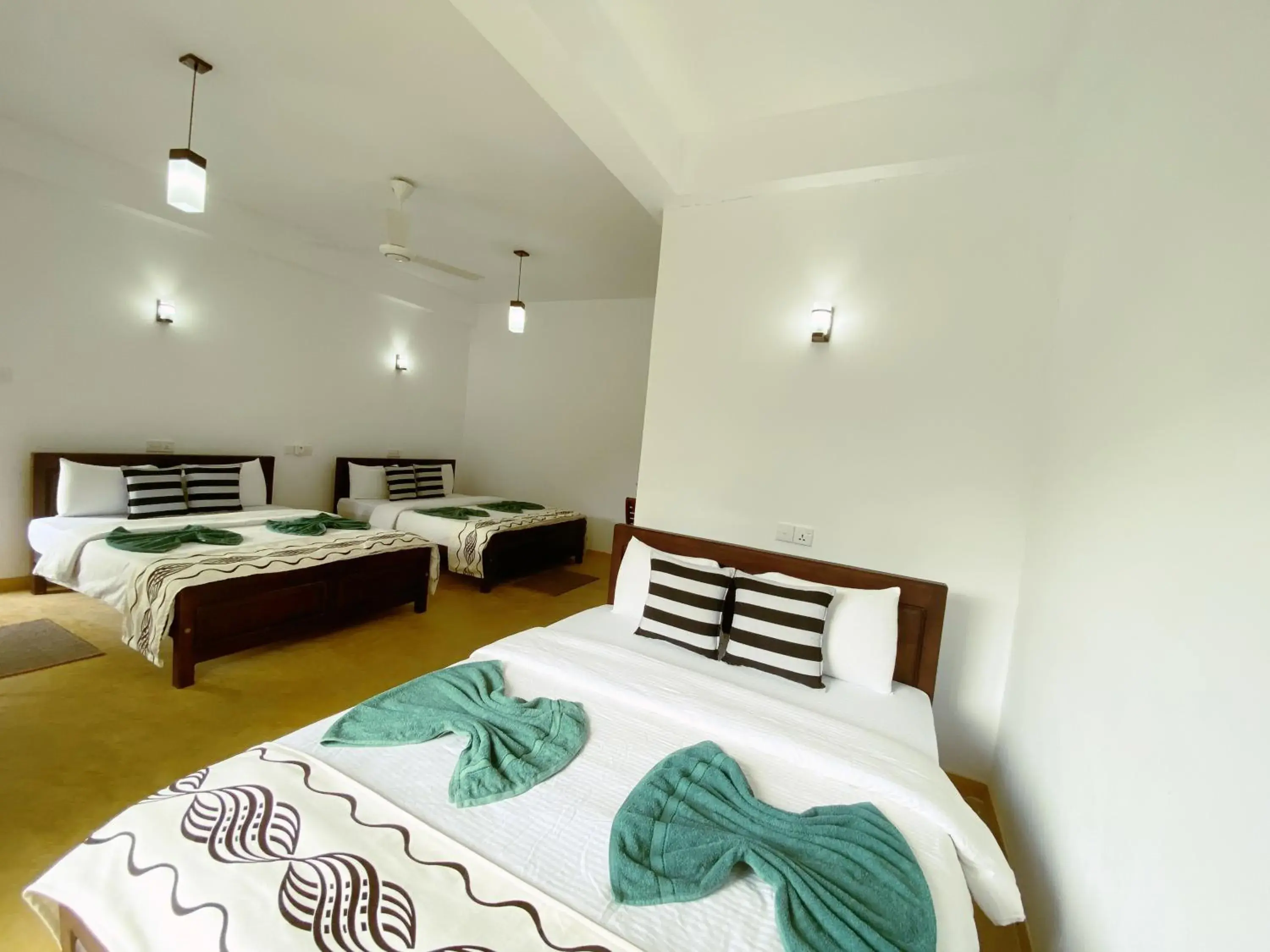 Family Room with Garden View in Misty Elegance - Ella. Family Room with Garden View in Misty Elegance - Ella.