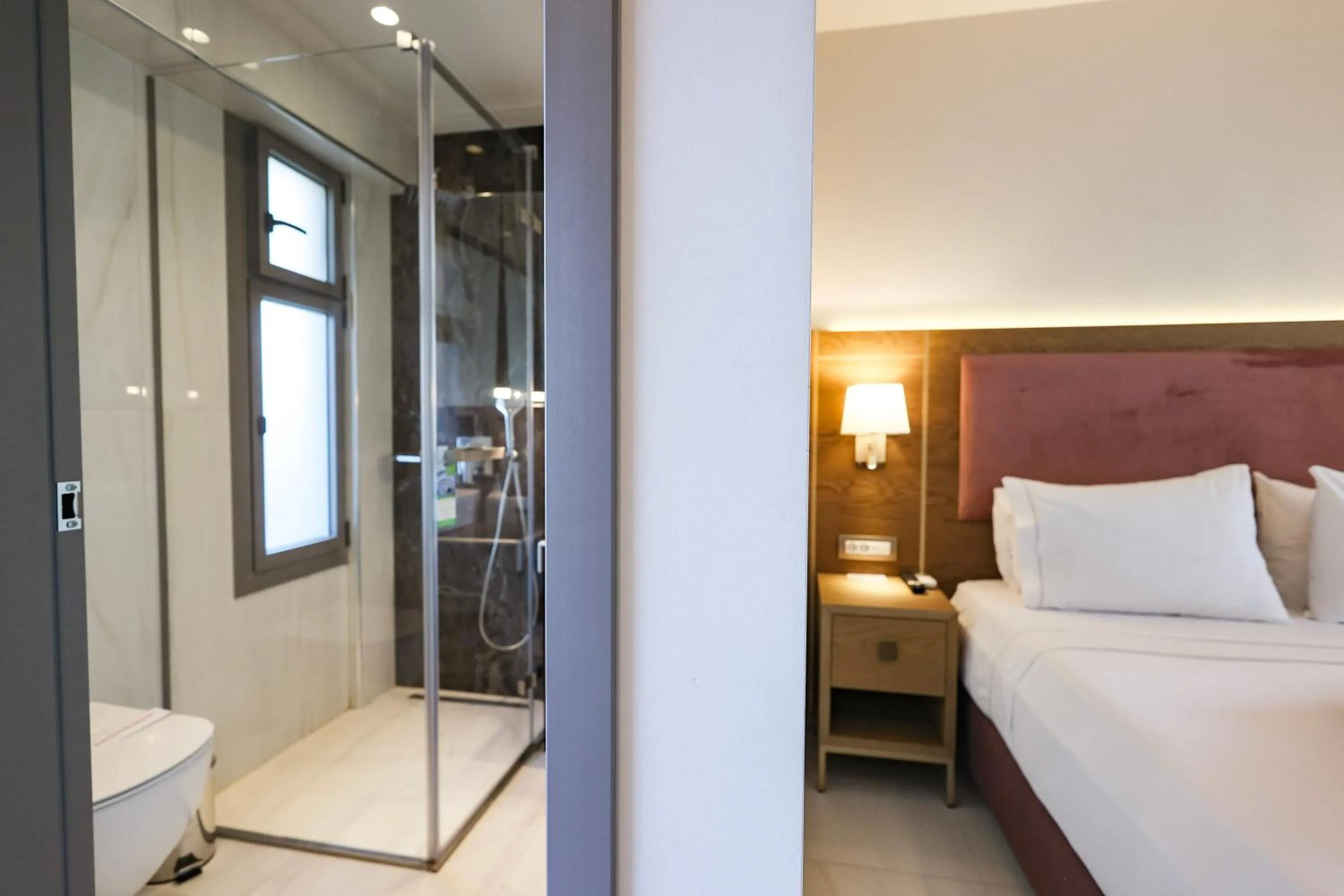 Bed in Serenity Suites