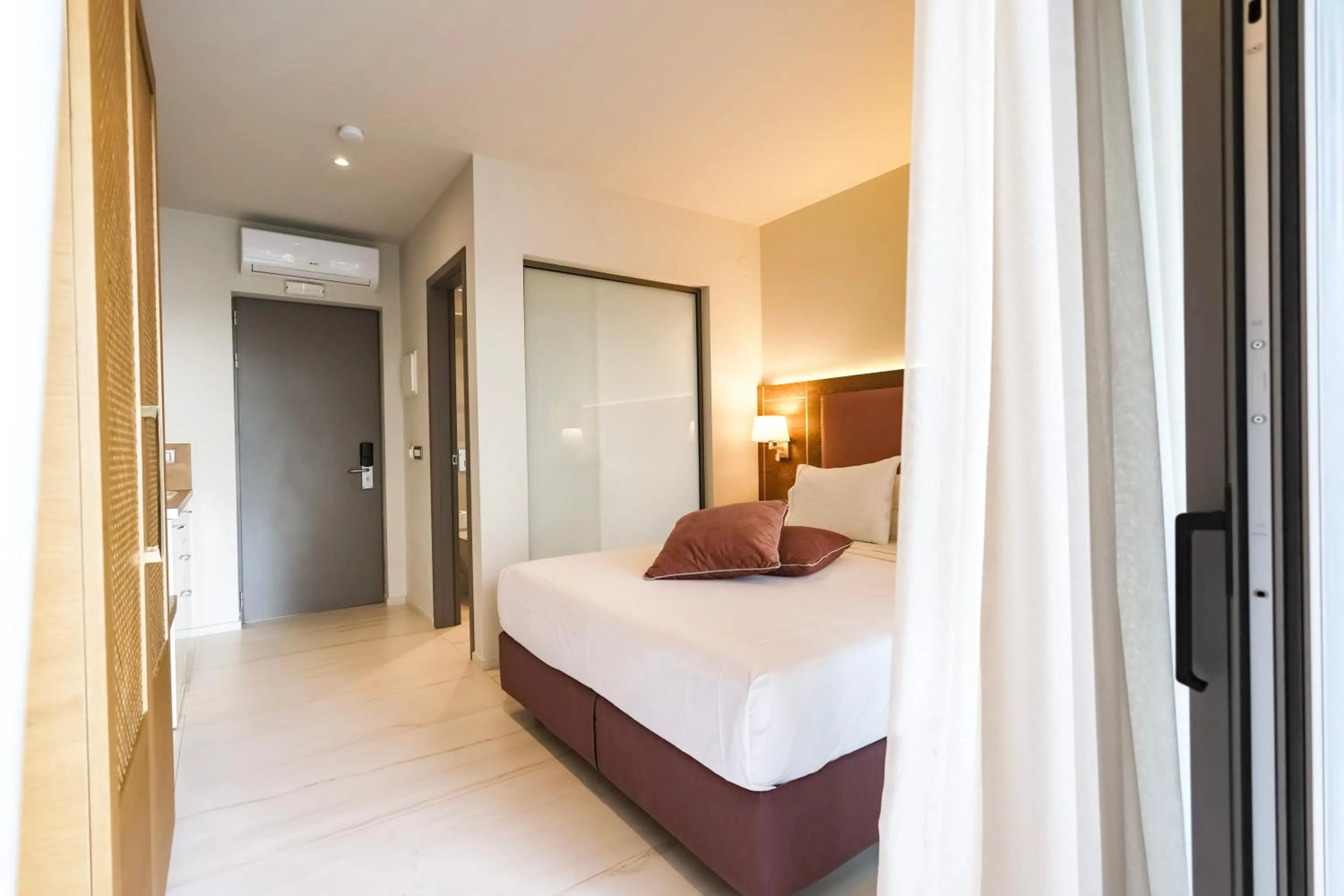 Bed in Serenity Suites