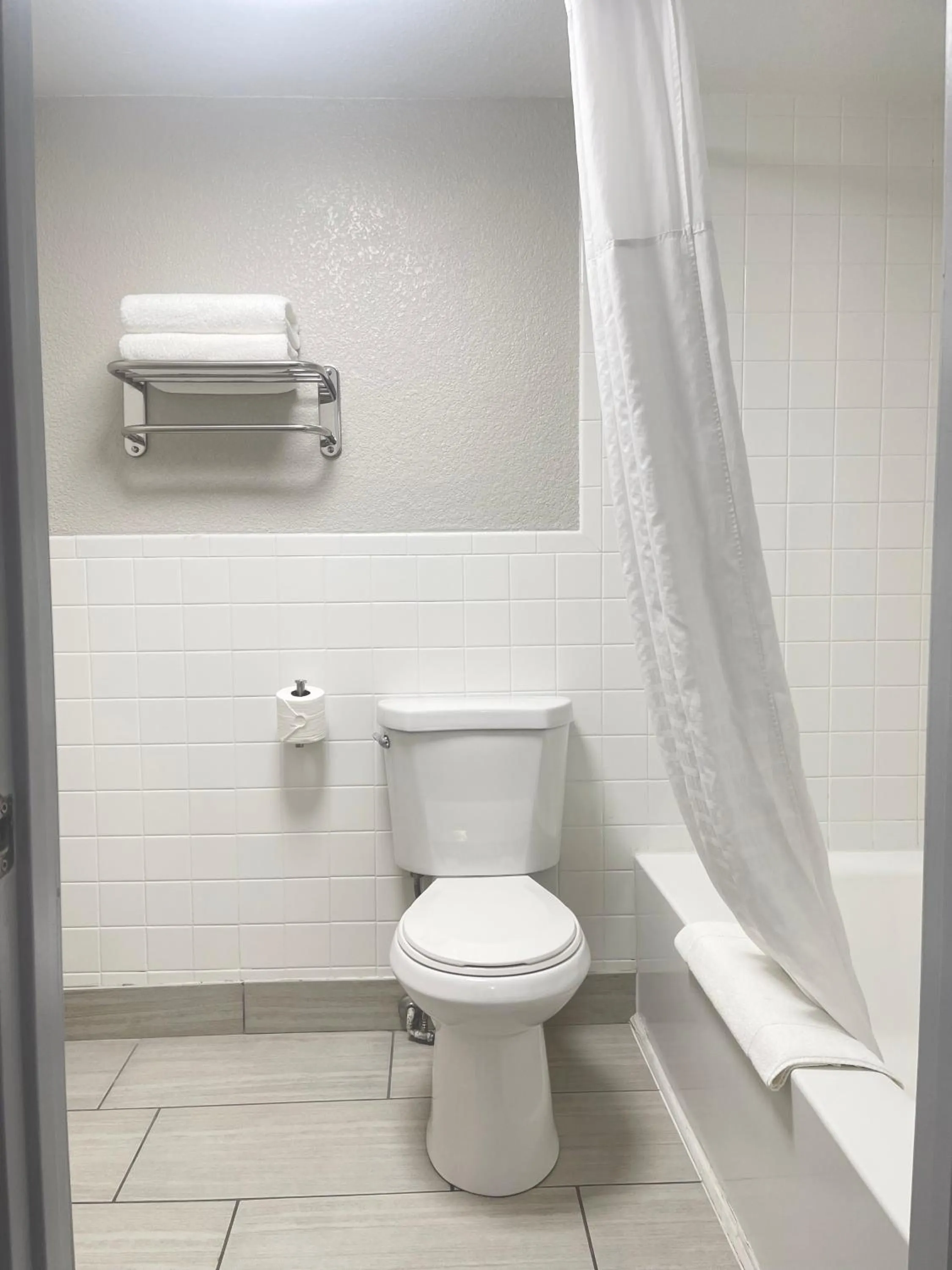 Bathroom in Days Inn & Suites by Wyndham Spokane