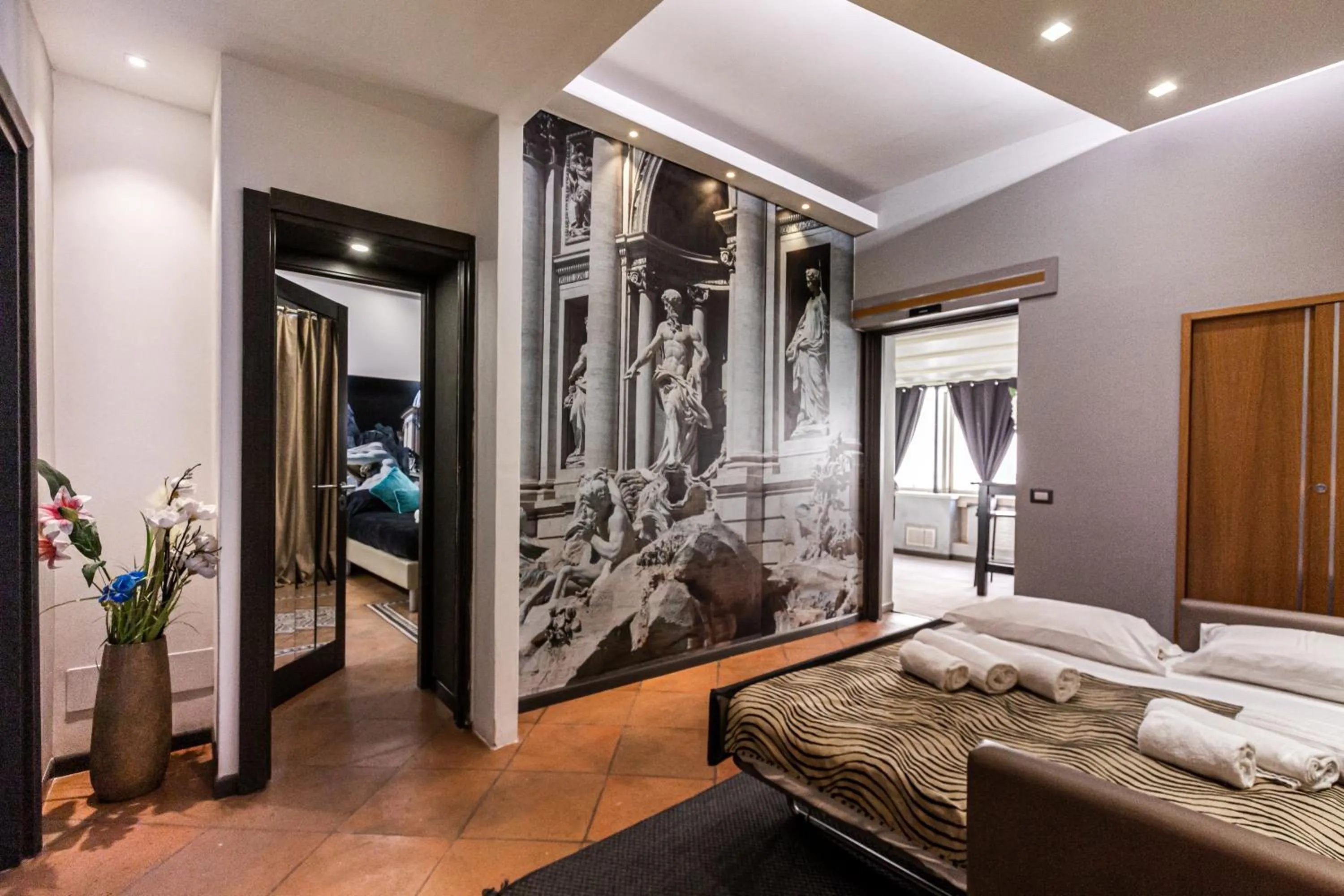 Bed in Daphne Suites