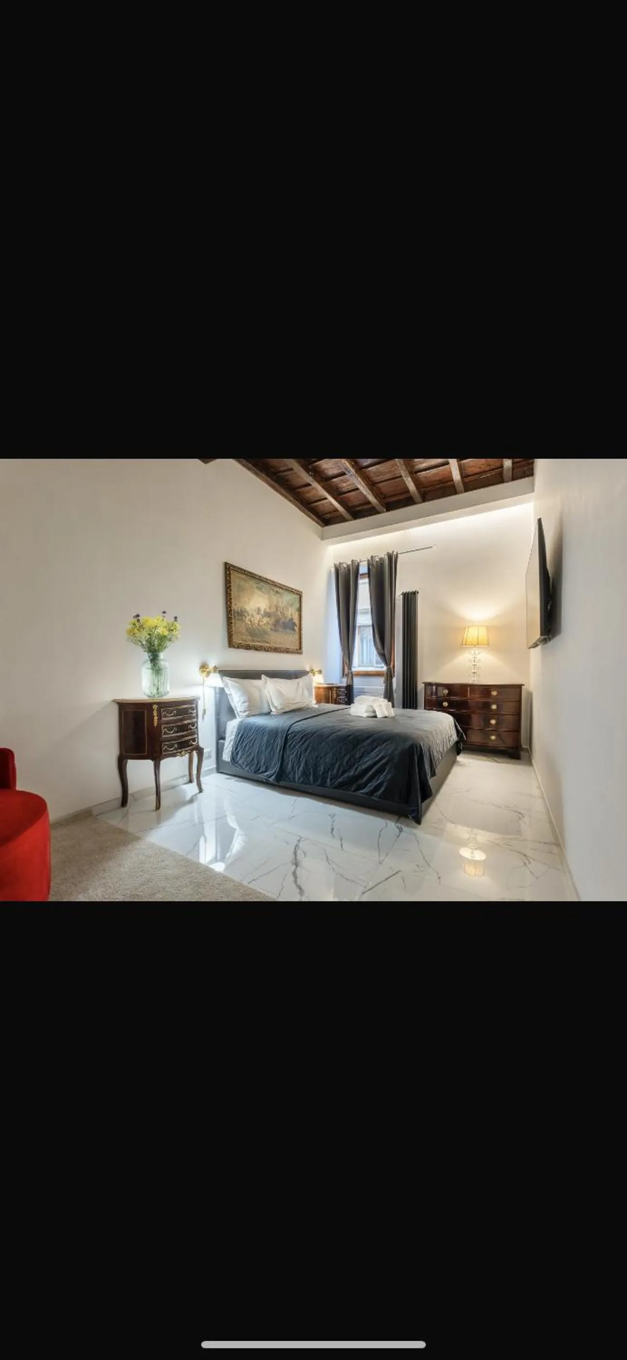 Bed in Daphne Suites