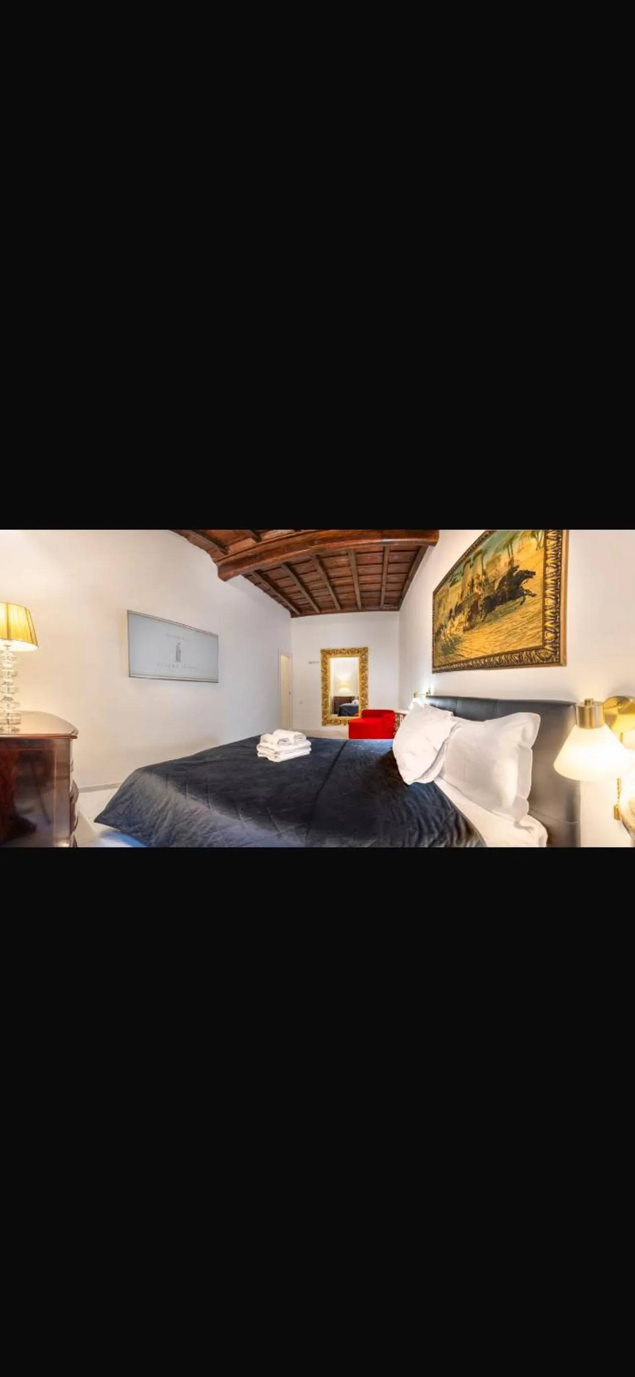 Bed in Daphne Suites