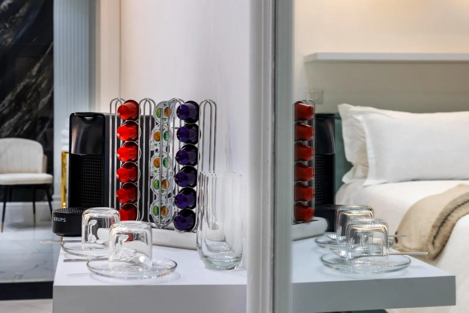 Bed in Daphne Suites