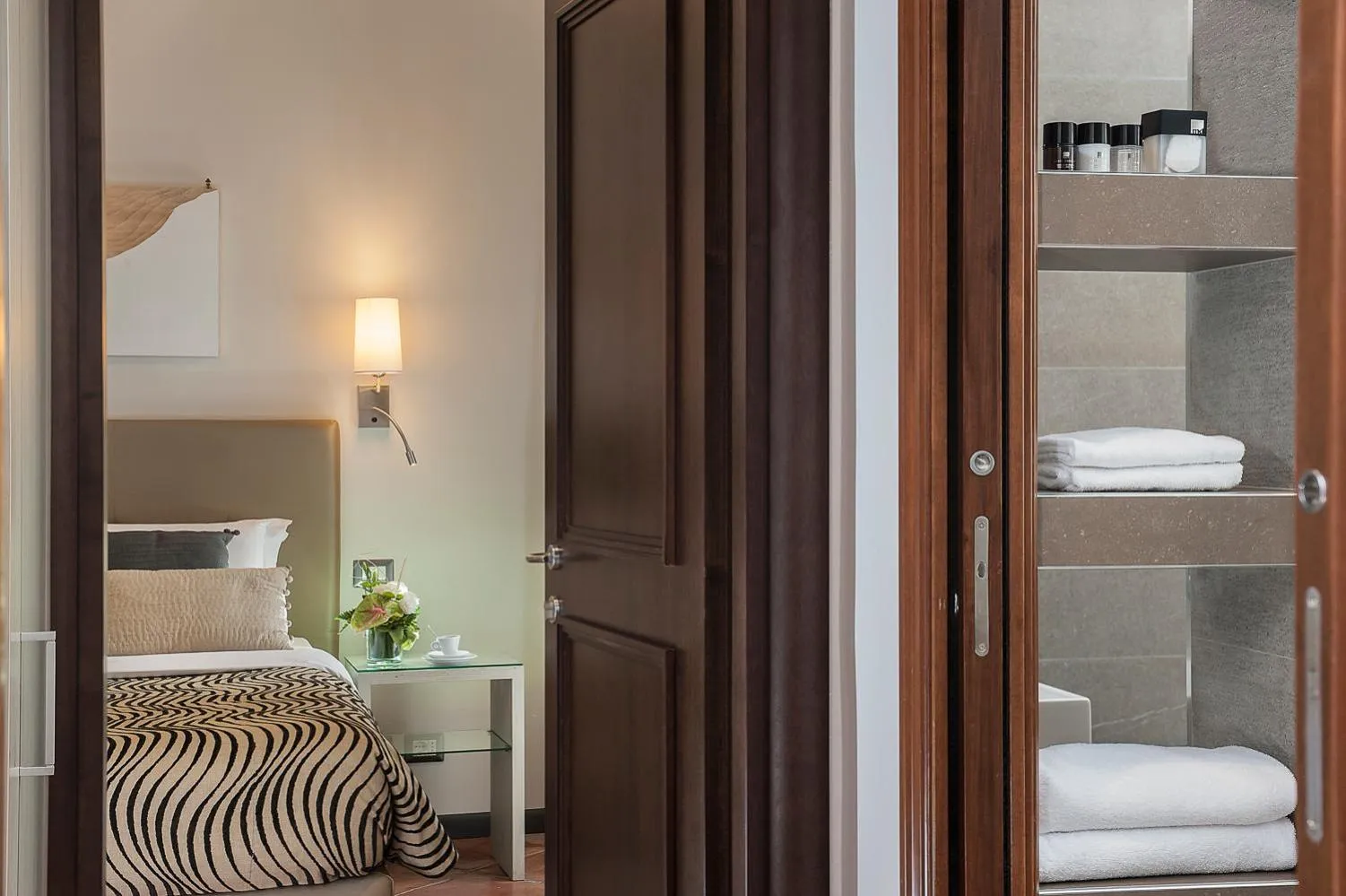 Bed in Daphne Suites