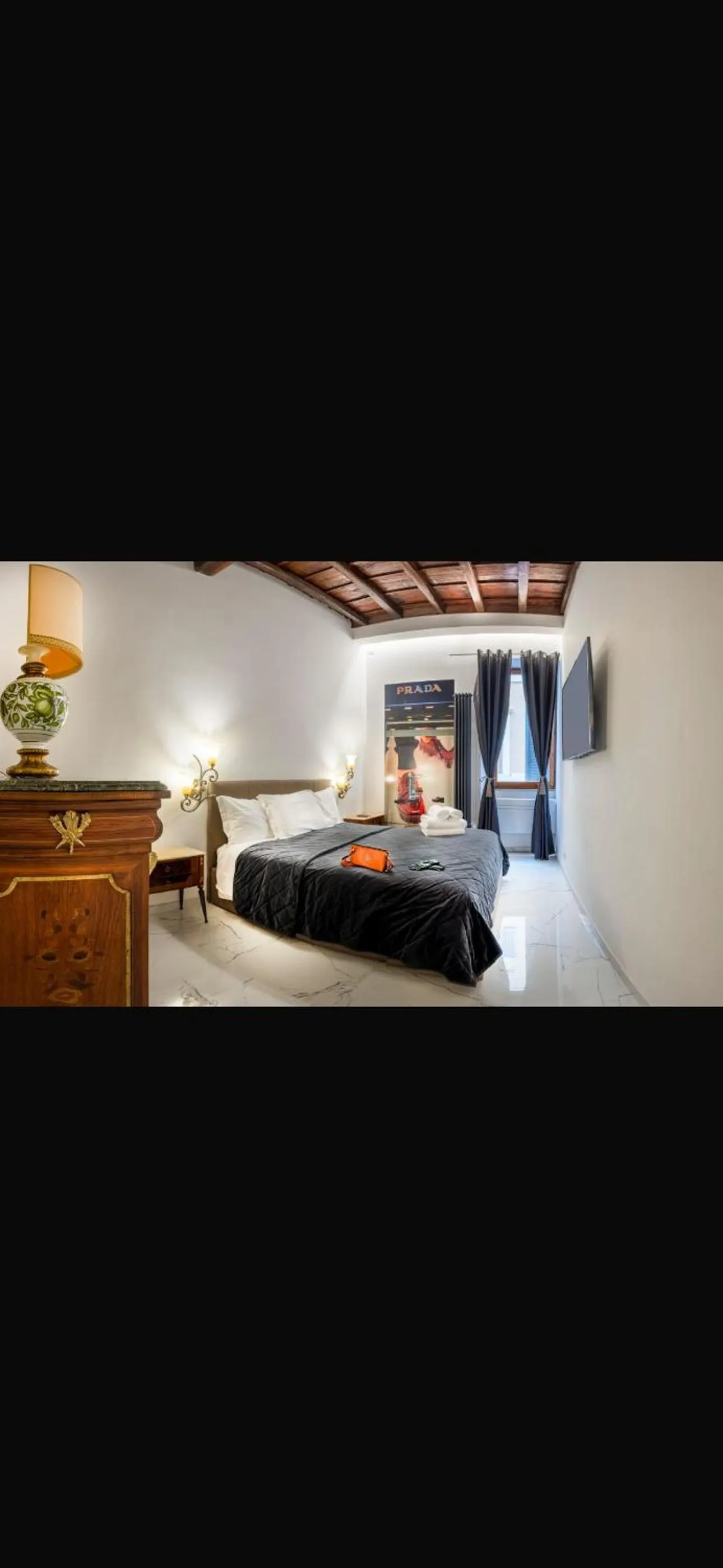 Bed in Daphne Suites