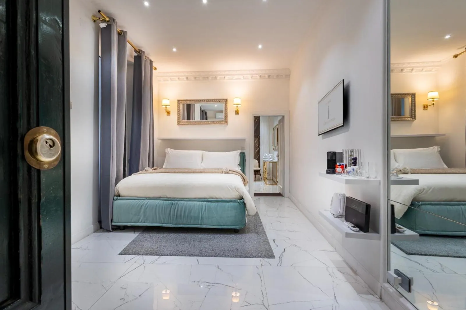 Bed in Daphne Suites