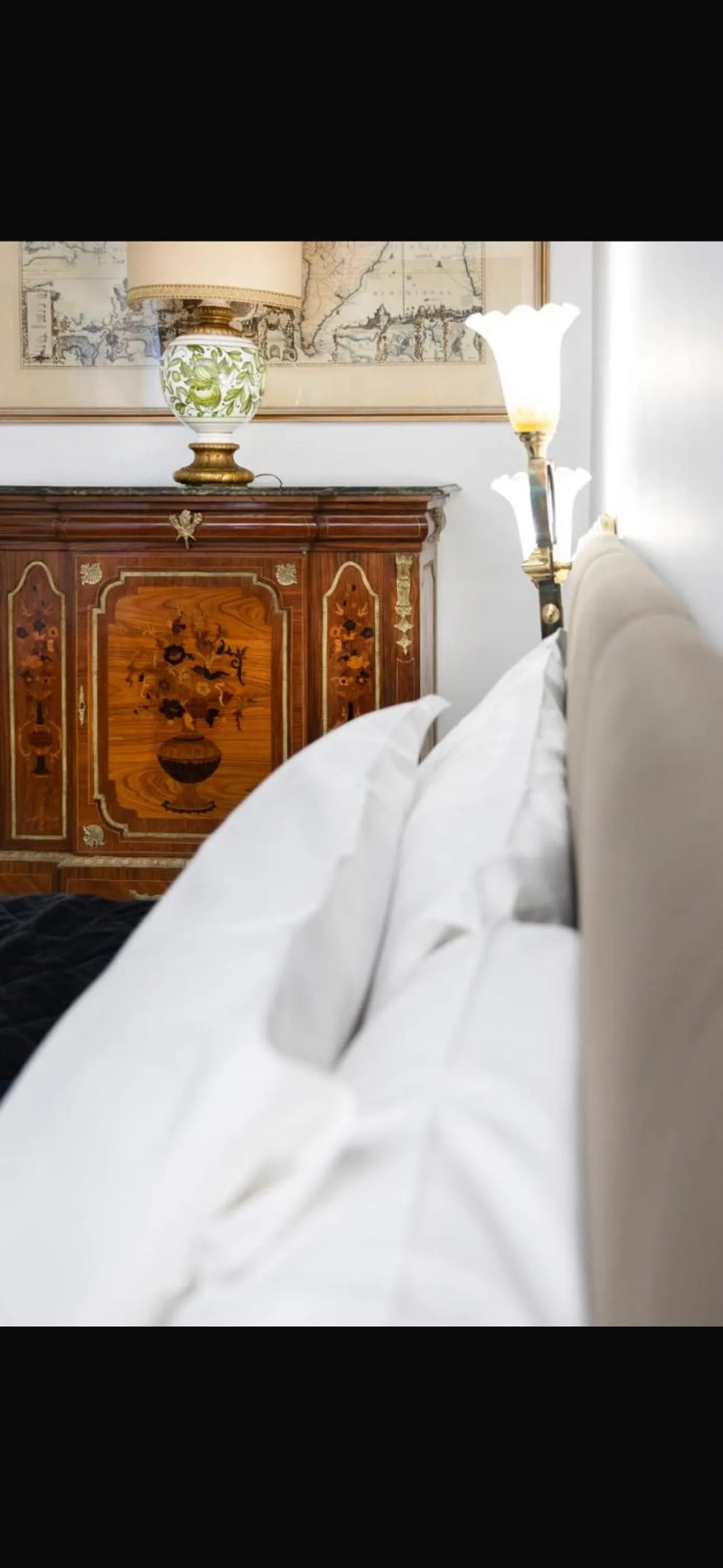 Bed in Daphne Suites