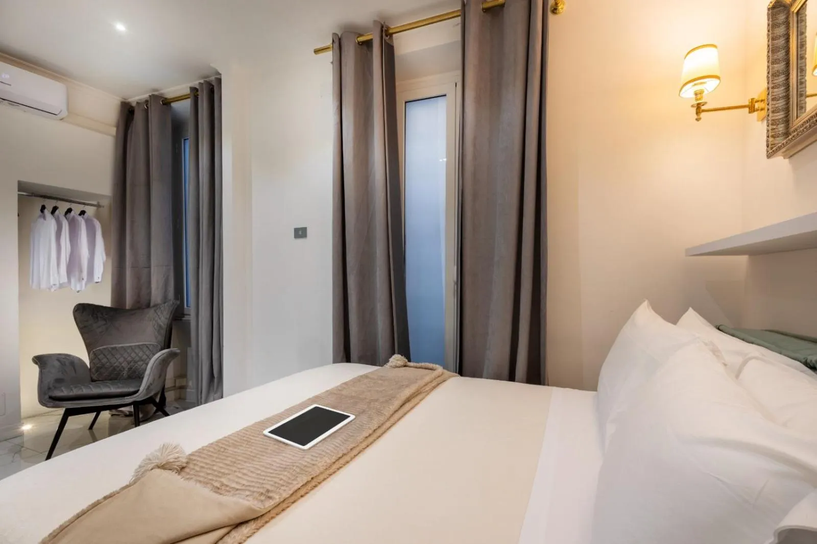 Bed in Daphne Suites