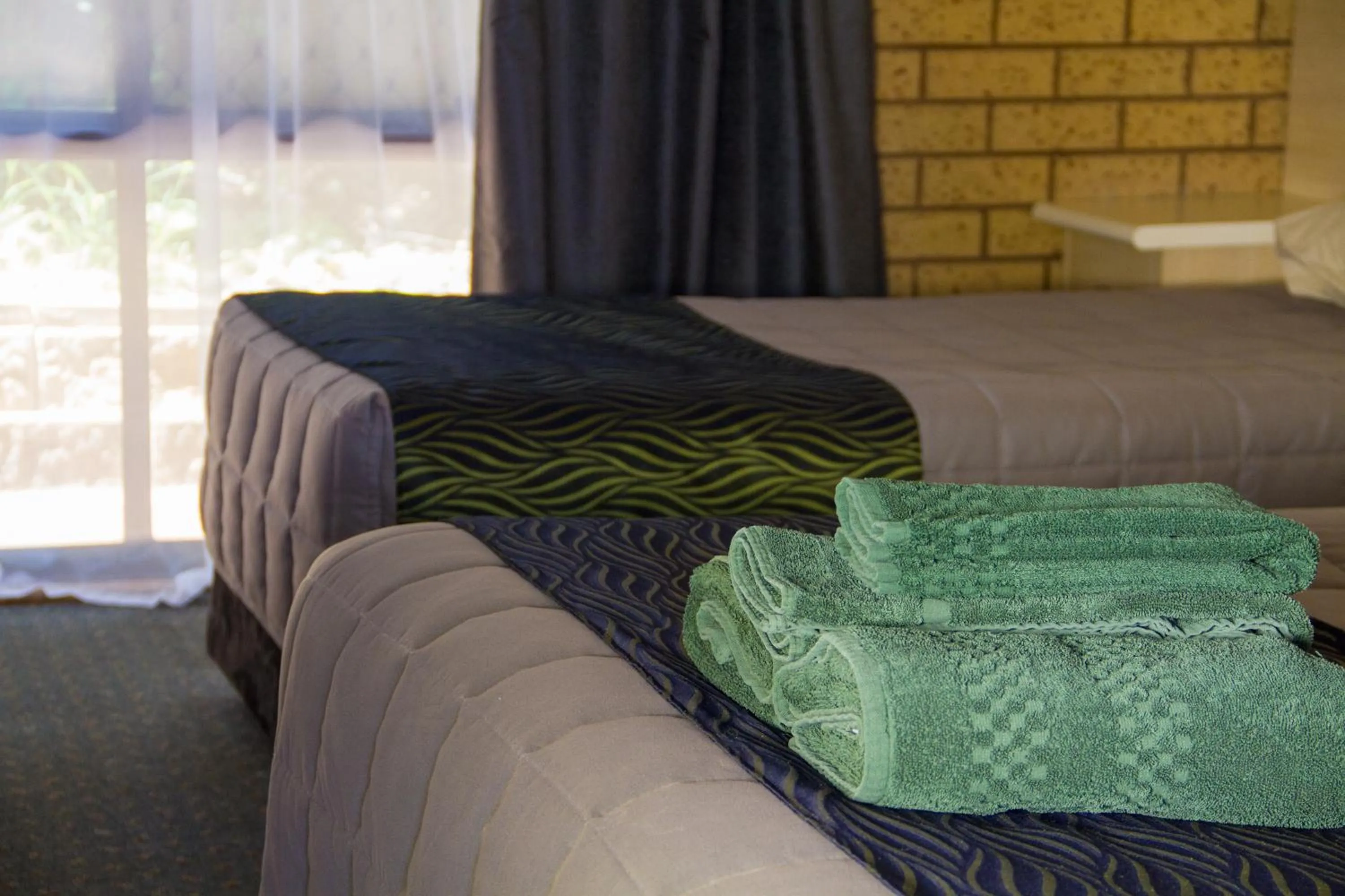 Bed in Fountain View Motel