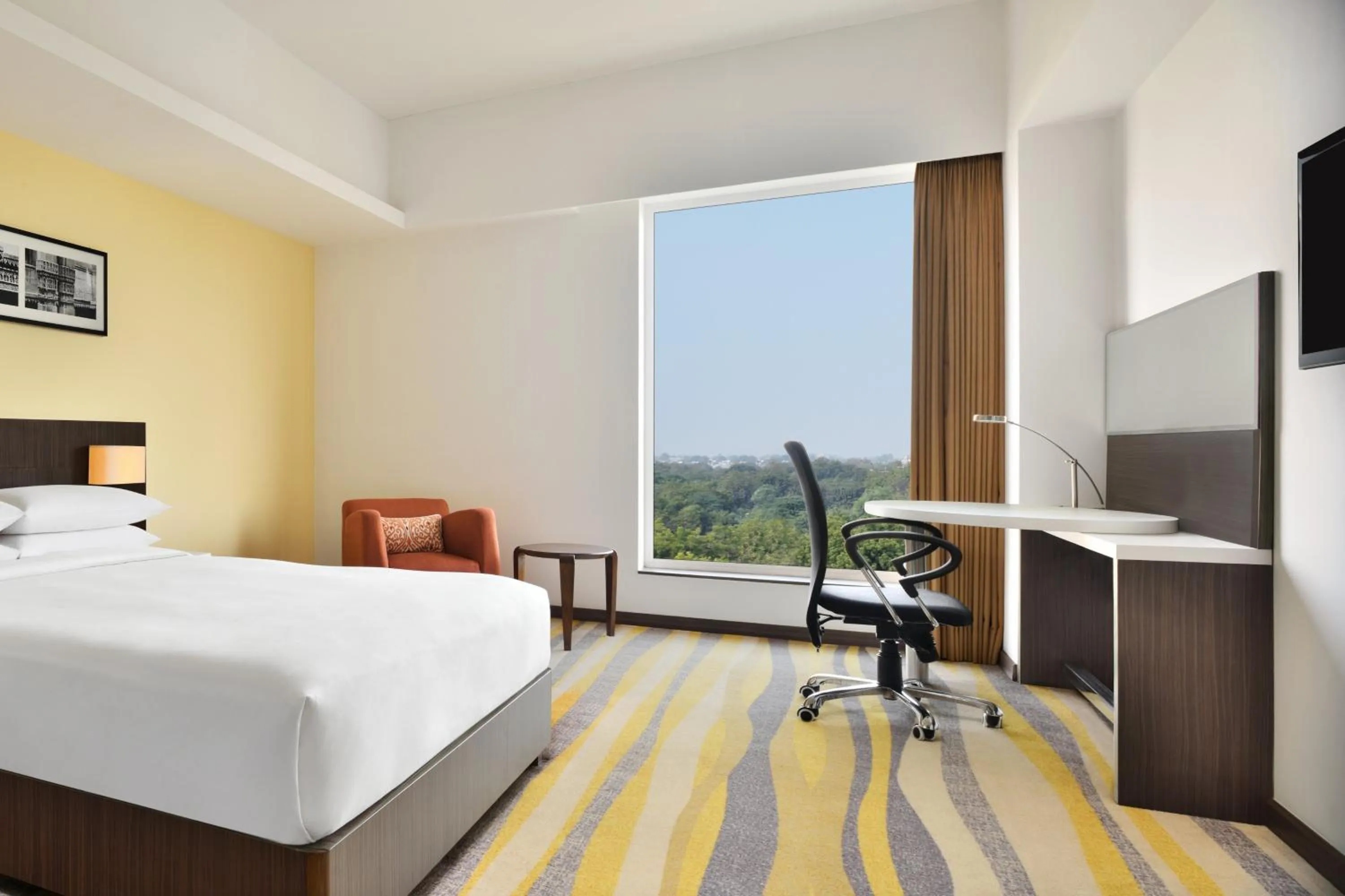 Photo of the whole room, Bed in Fairfield by Marriott Ahmedabad