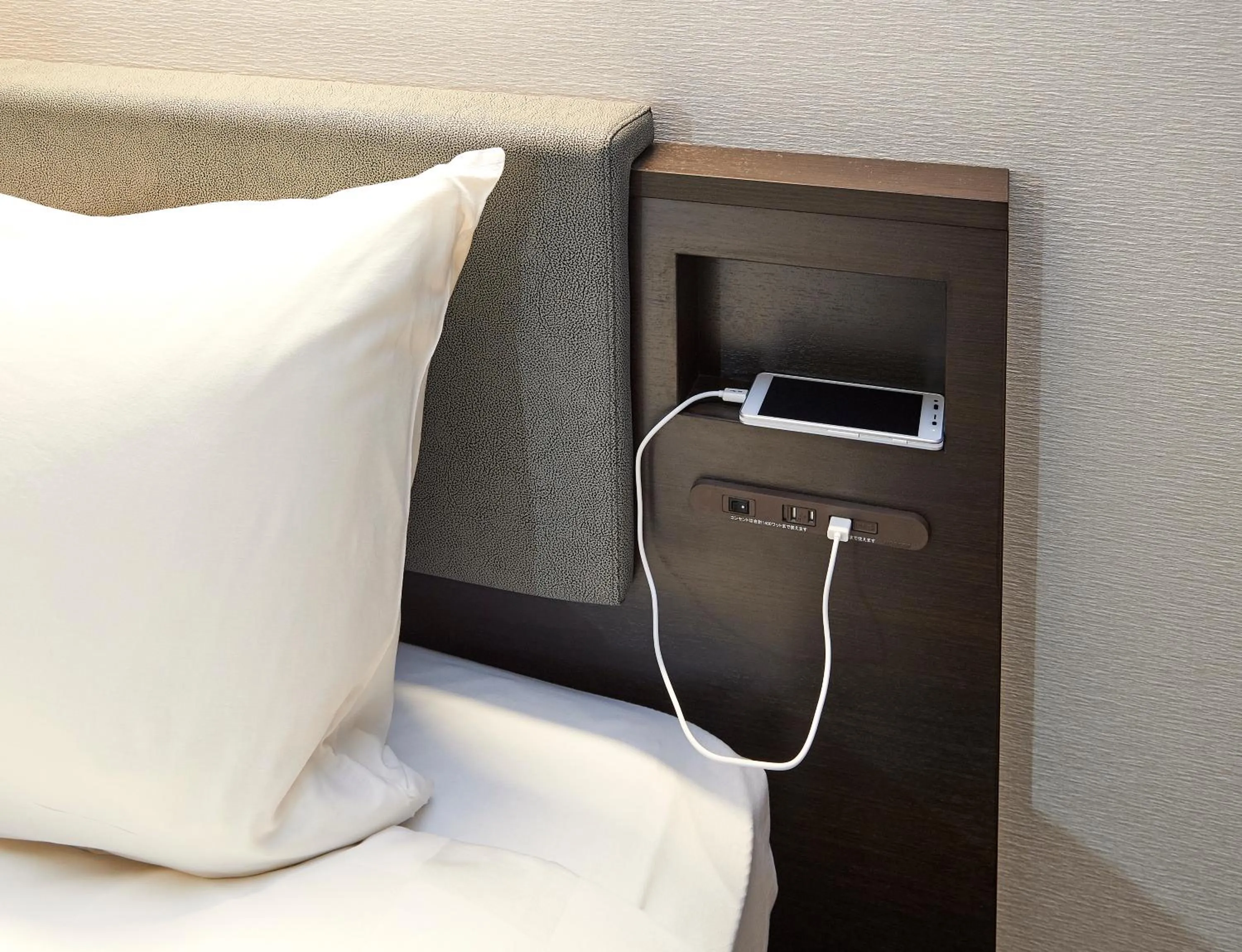 Bed in Hotel Consort Shin-Osaka