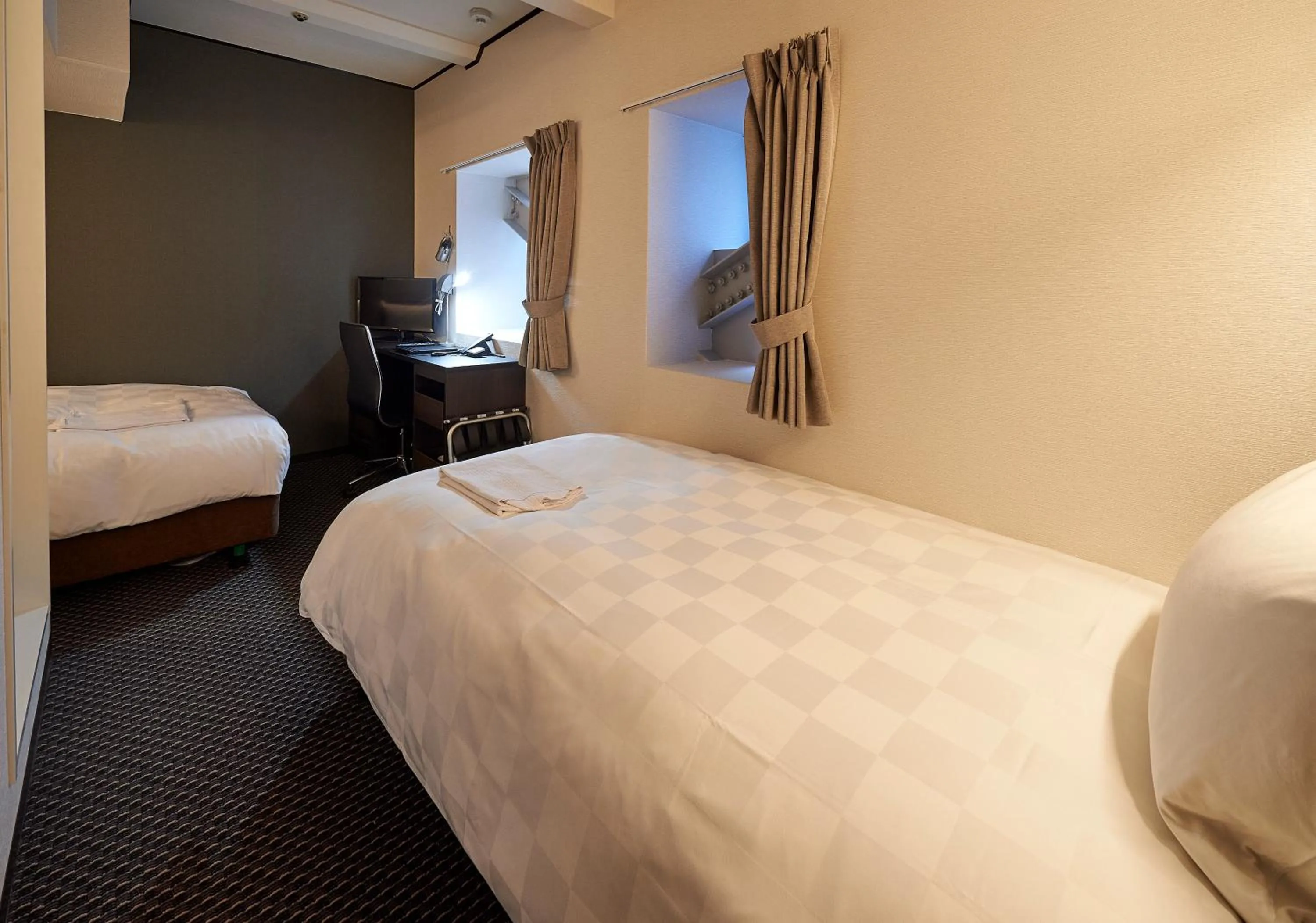 Photo of the whole room, Bed in Hotel Consort Shin-Osaka