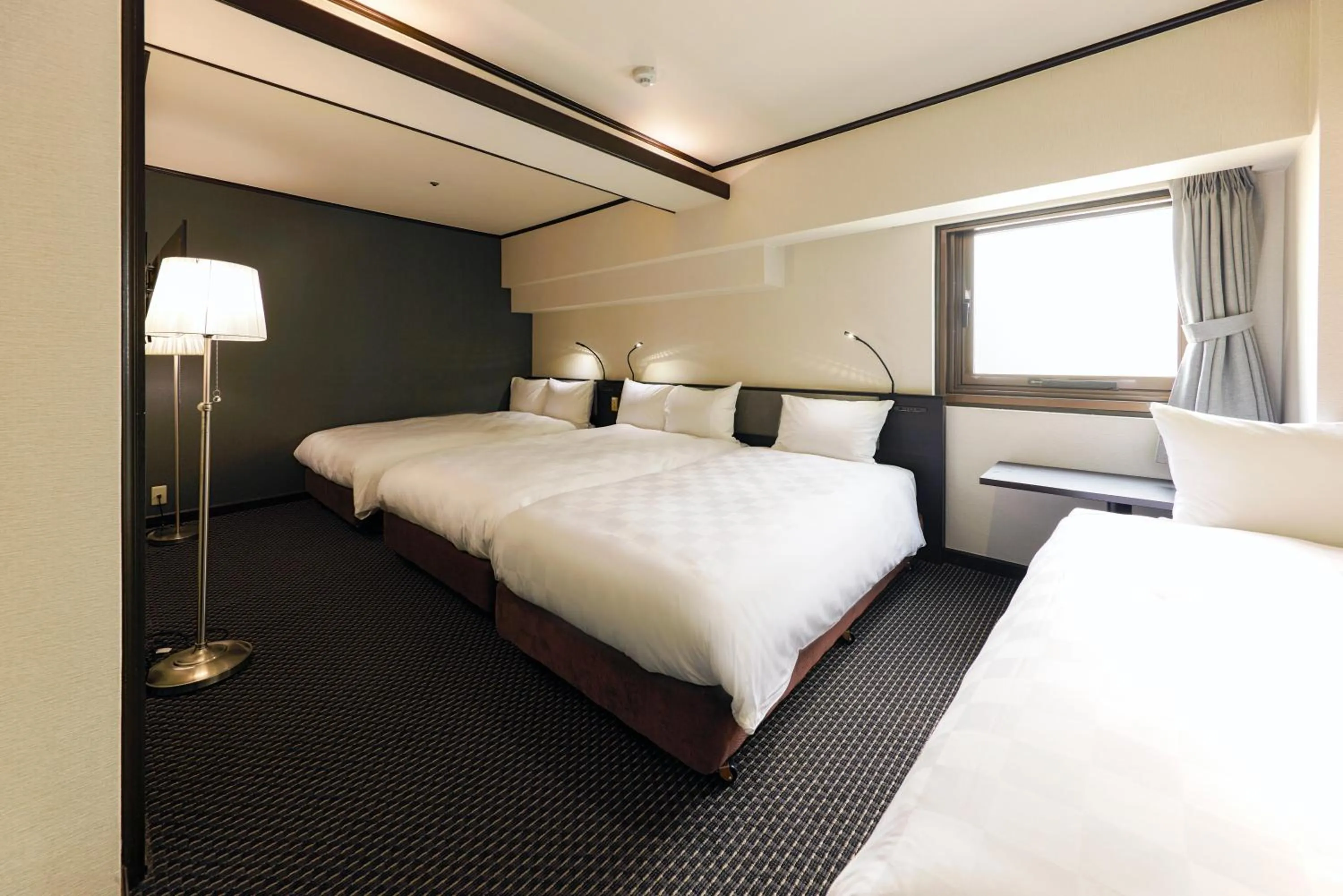 Photo of the whole room, Bed in Hotel Consort Shin-Osaka