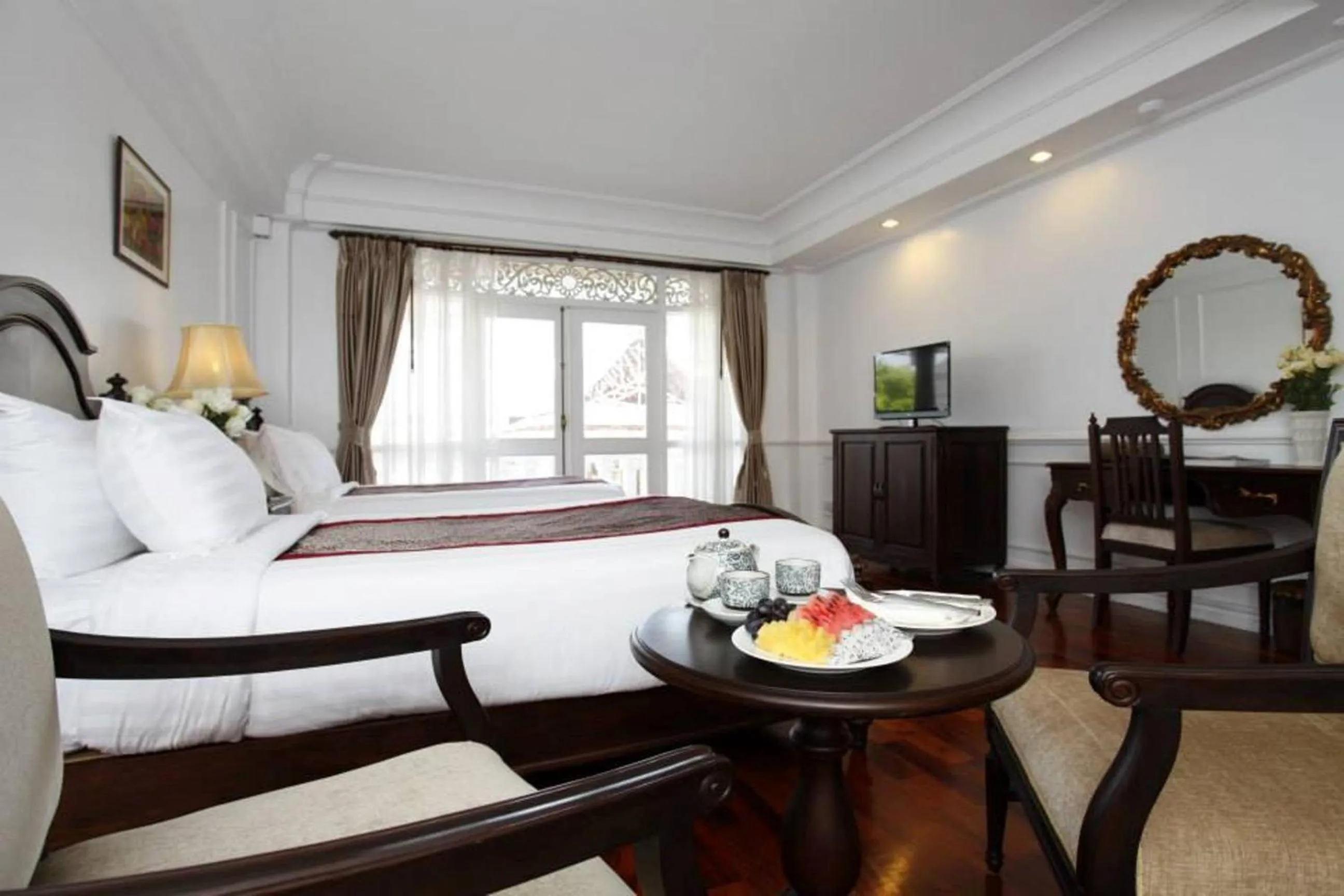 Bed in Dhavara Boutique Hotel