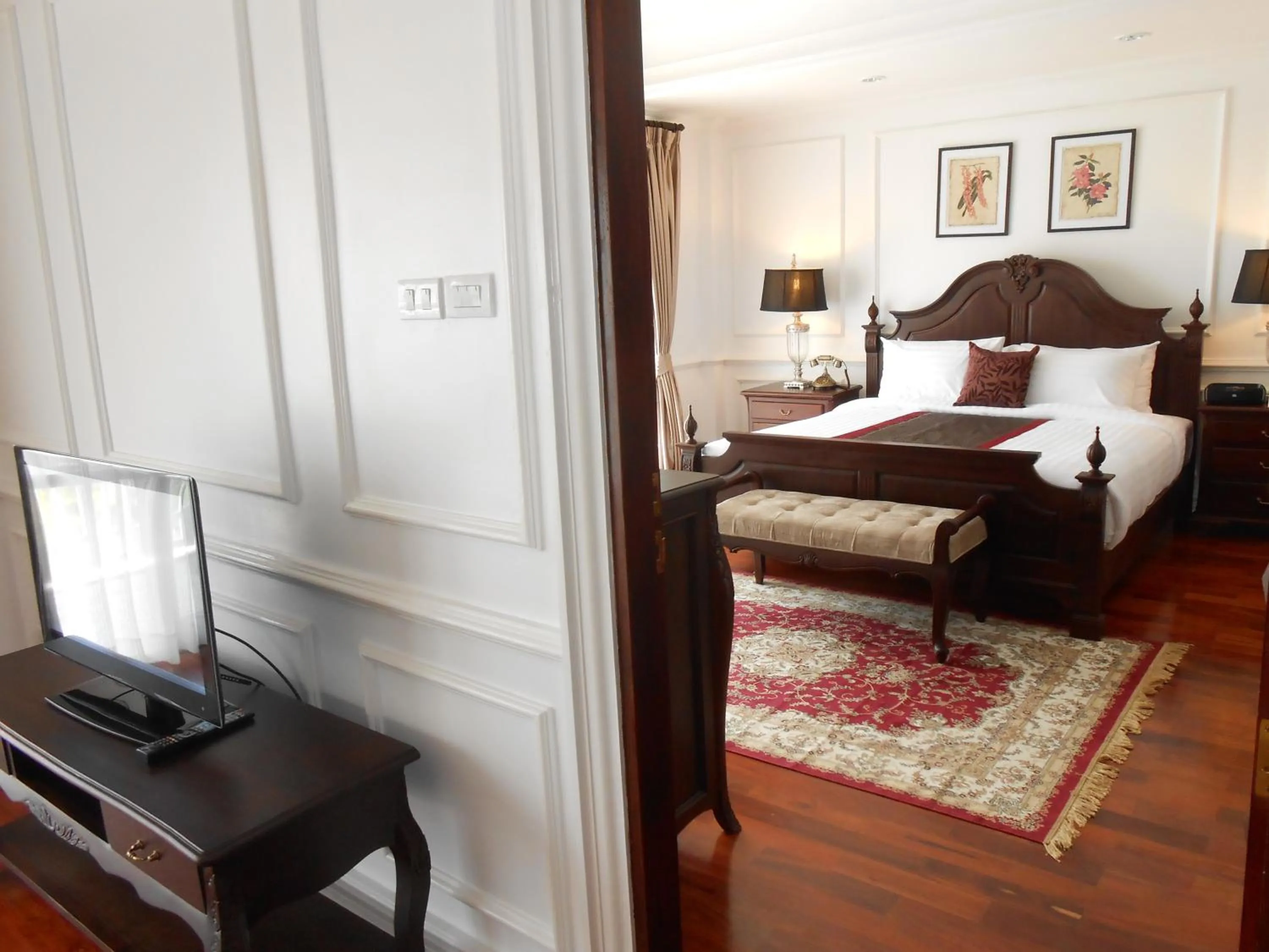 Bed in Dhavara Boutique Hotel