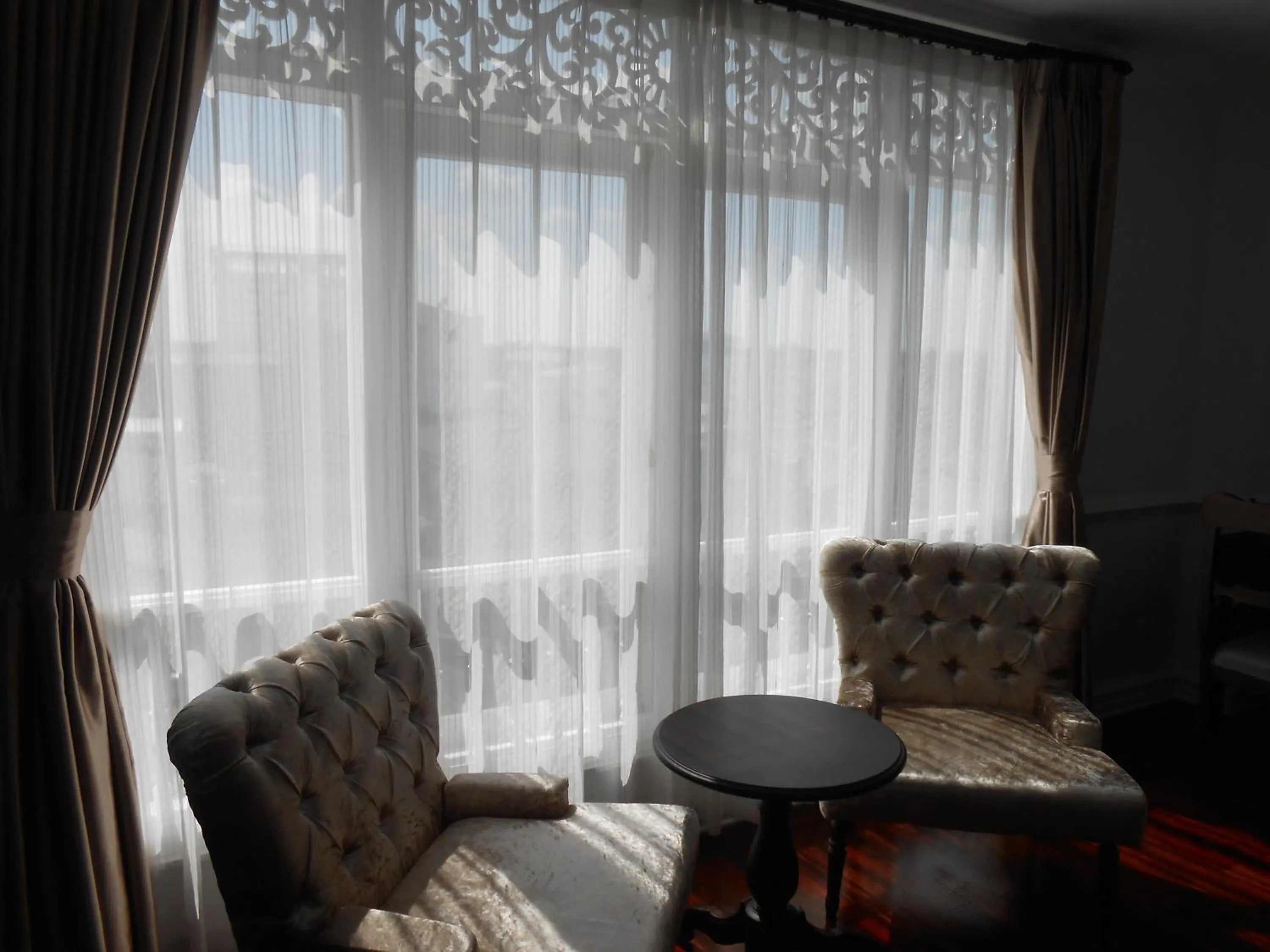 Seating area in Dhavara Boutique Hotel