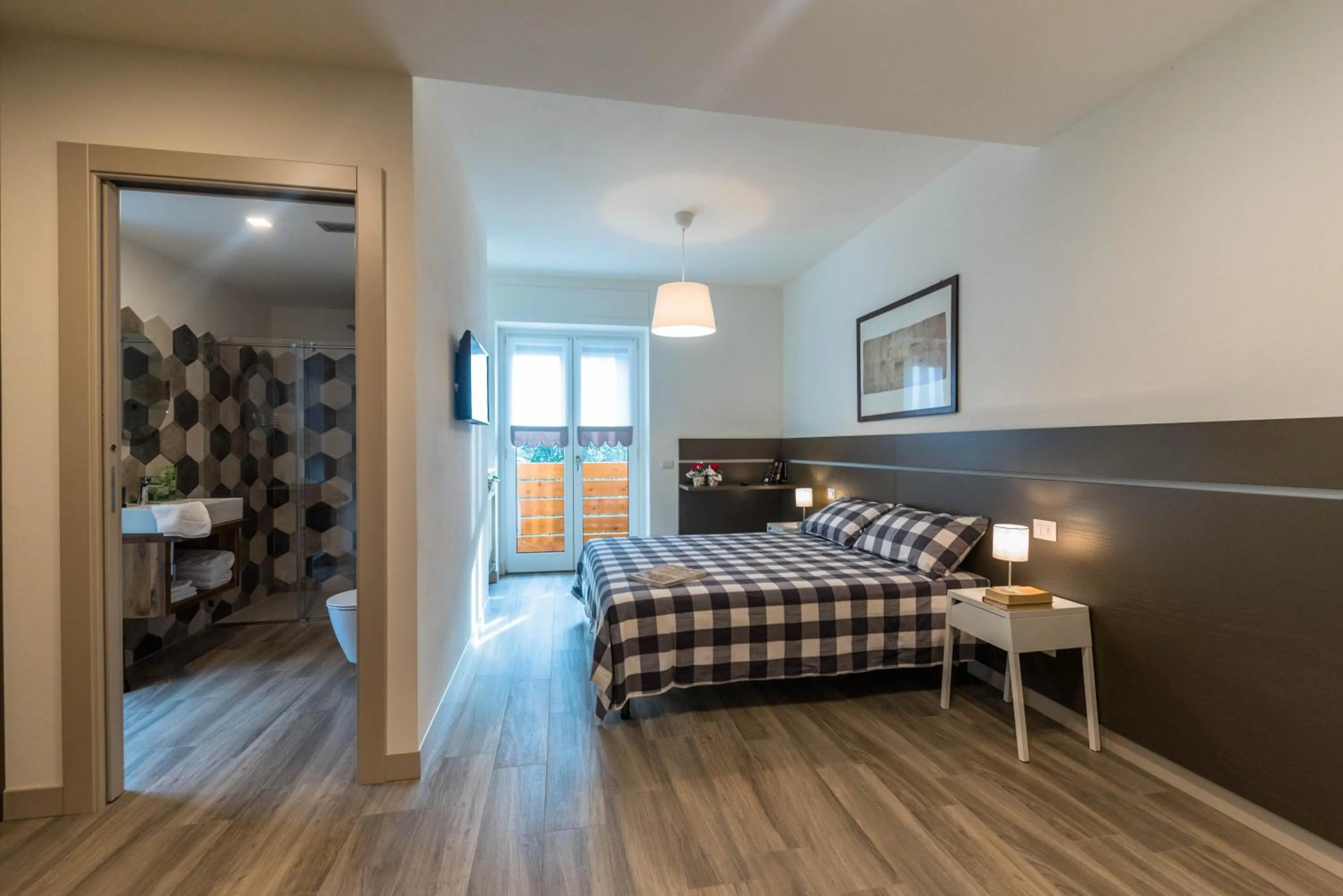 Bed in parina Inn – Locanda