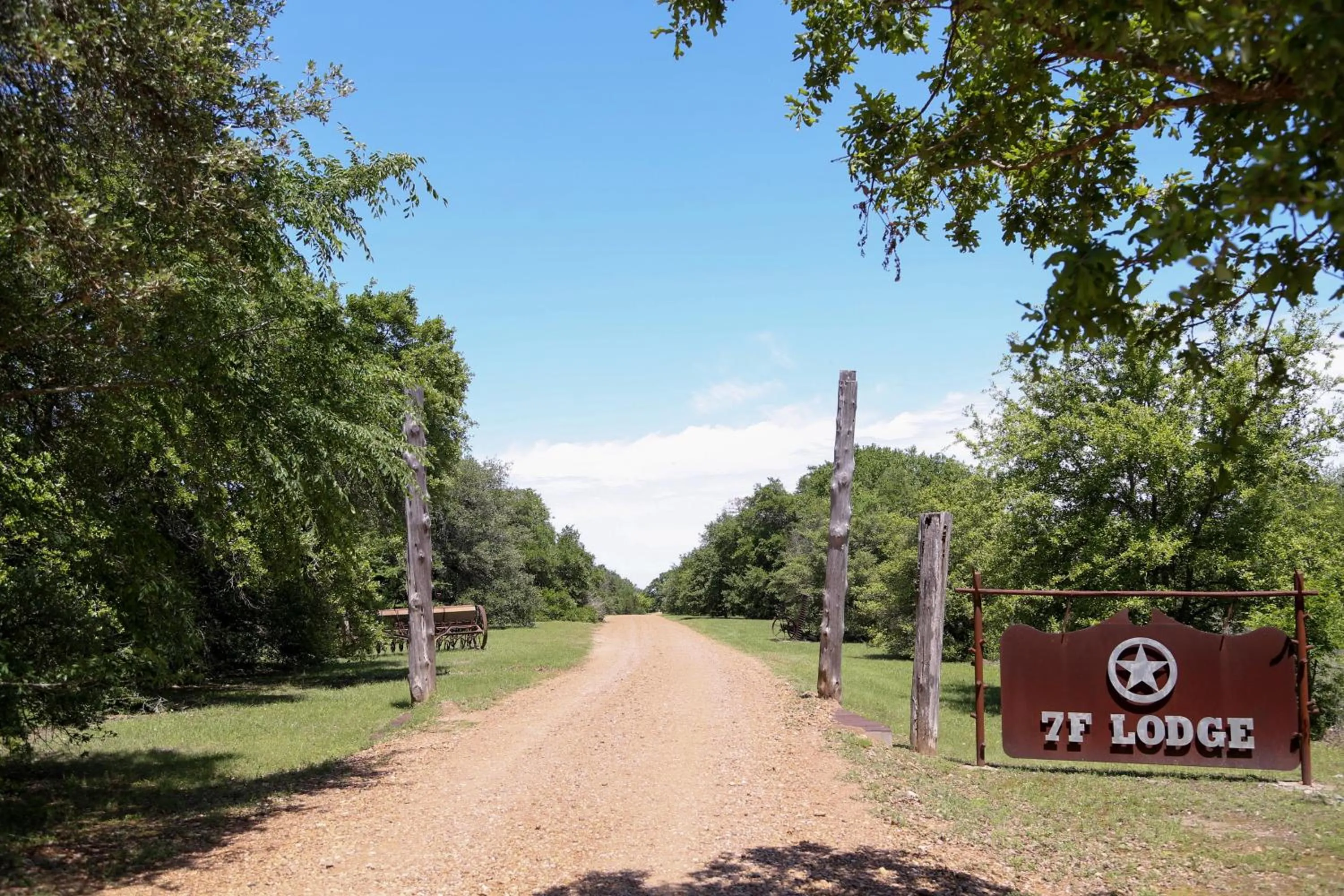 Property logo or sign in 7F Lodge and Events