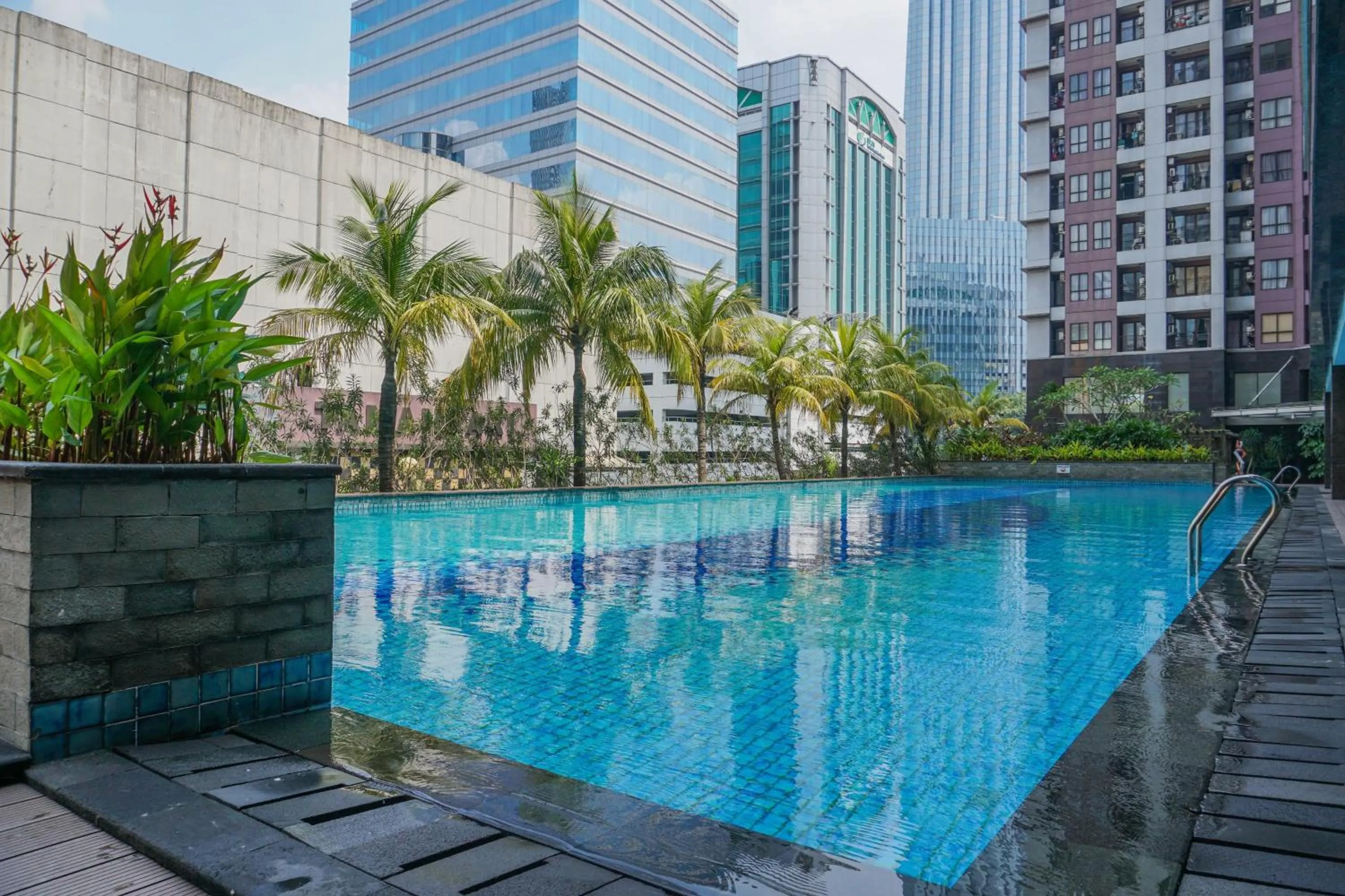 Swimming pool in Best and Homey 2BR Taman Sari Semanggi Apartment By Travelio
