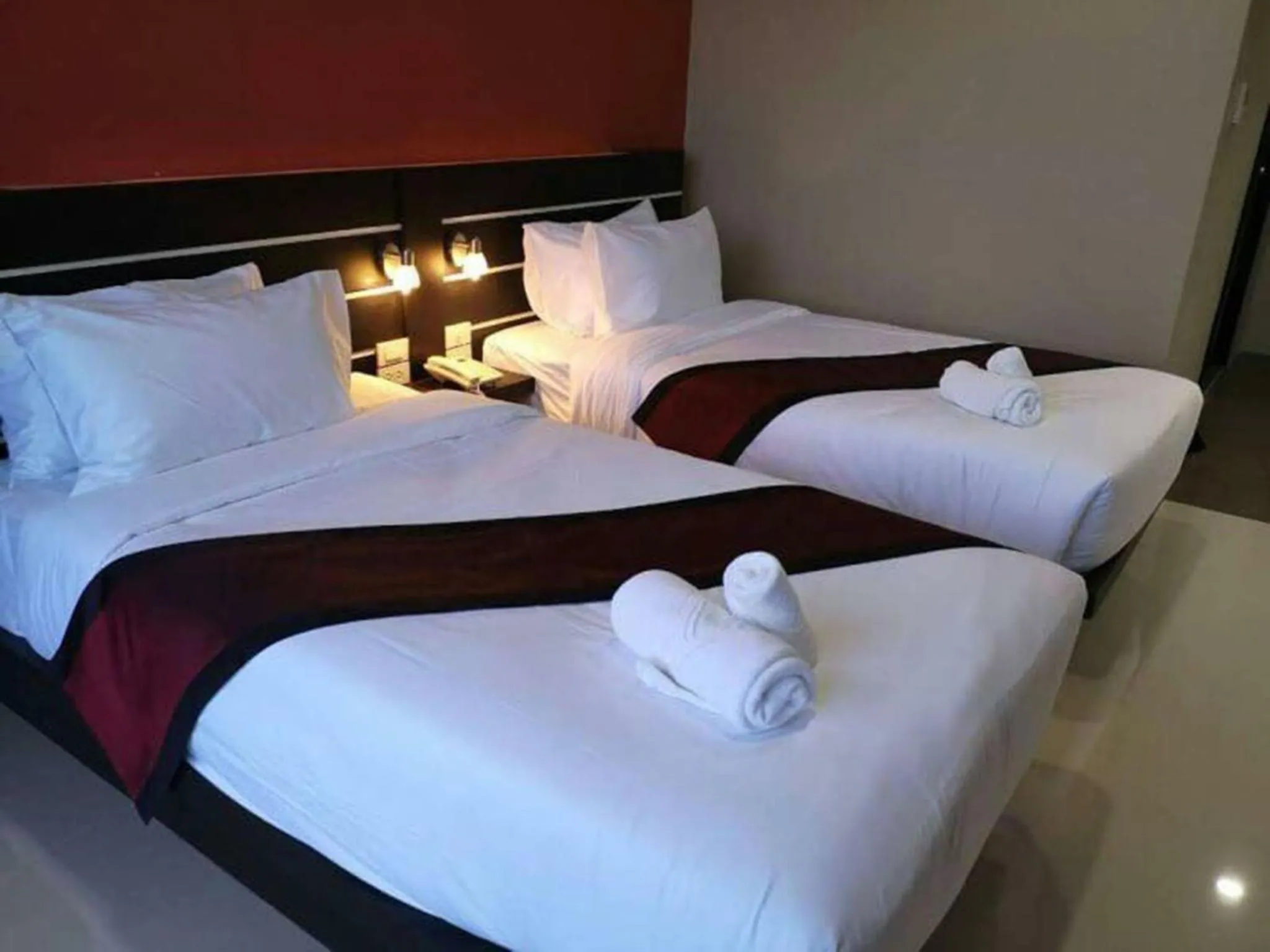 Bed in The Harbour Front Hotel