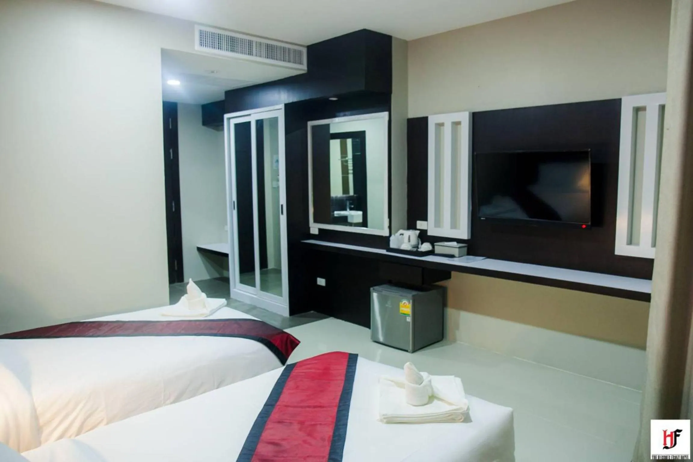 Photo of the whole room, Bed in The Harbour Front Hotel