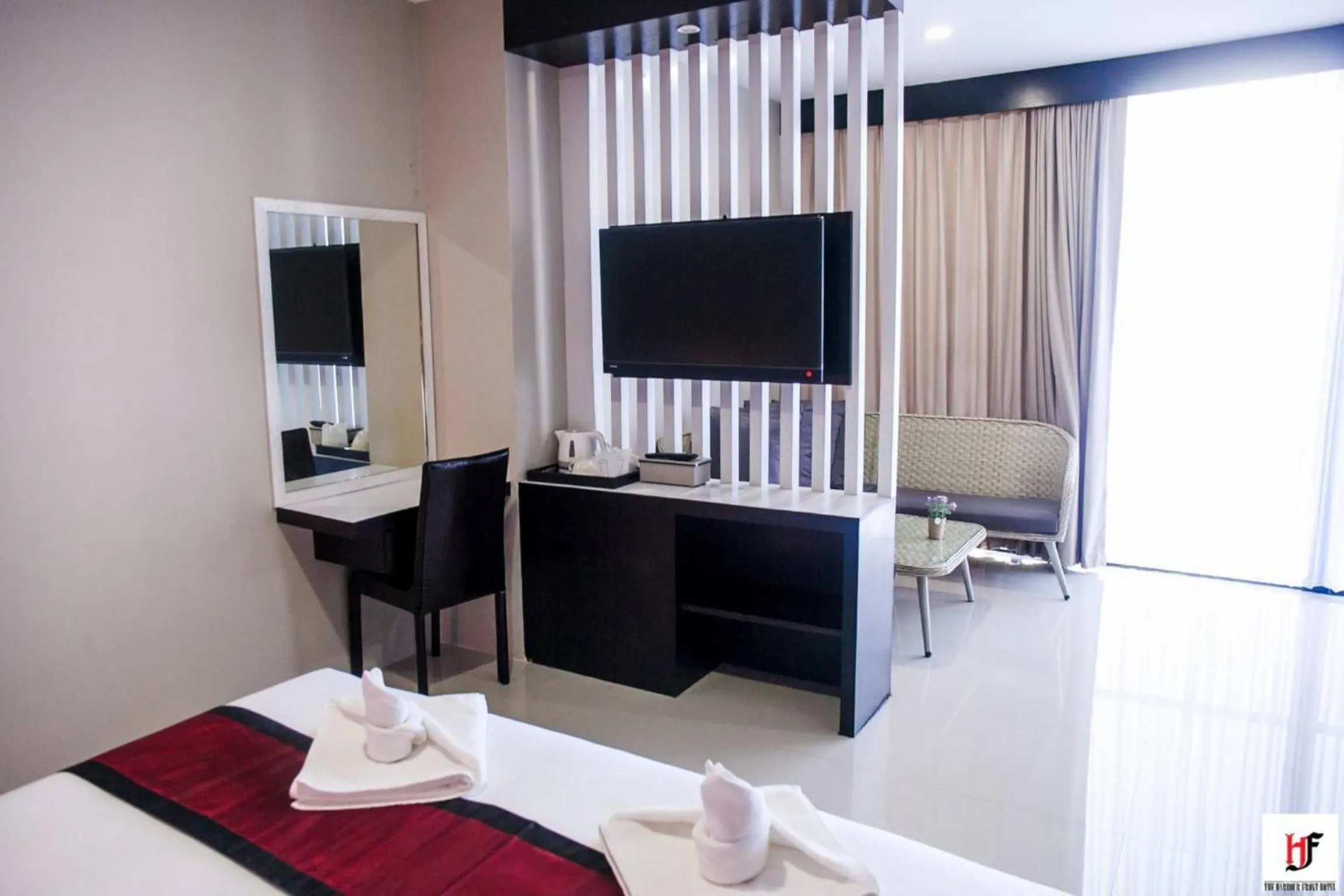 Photo of the whole room, Bed in The Harbour Front Hotel