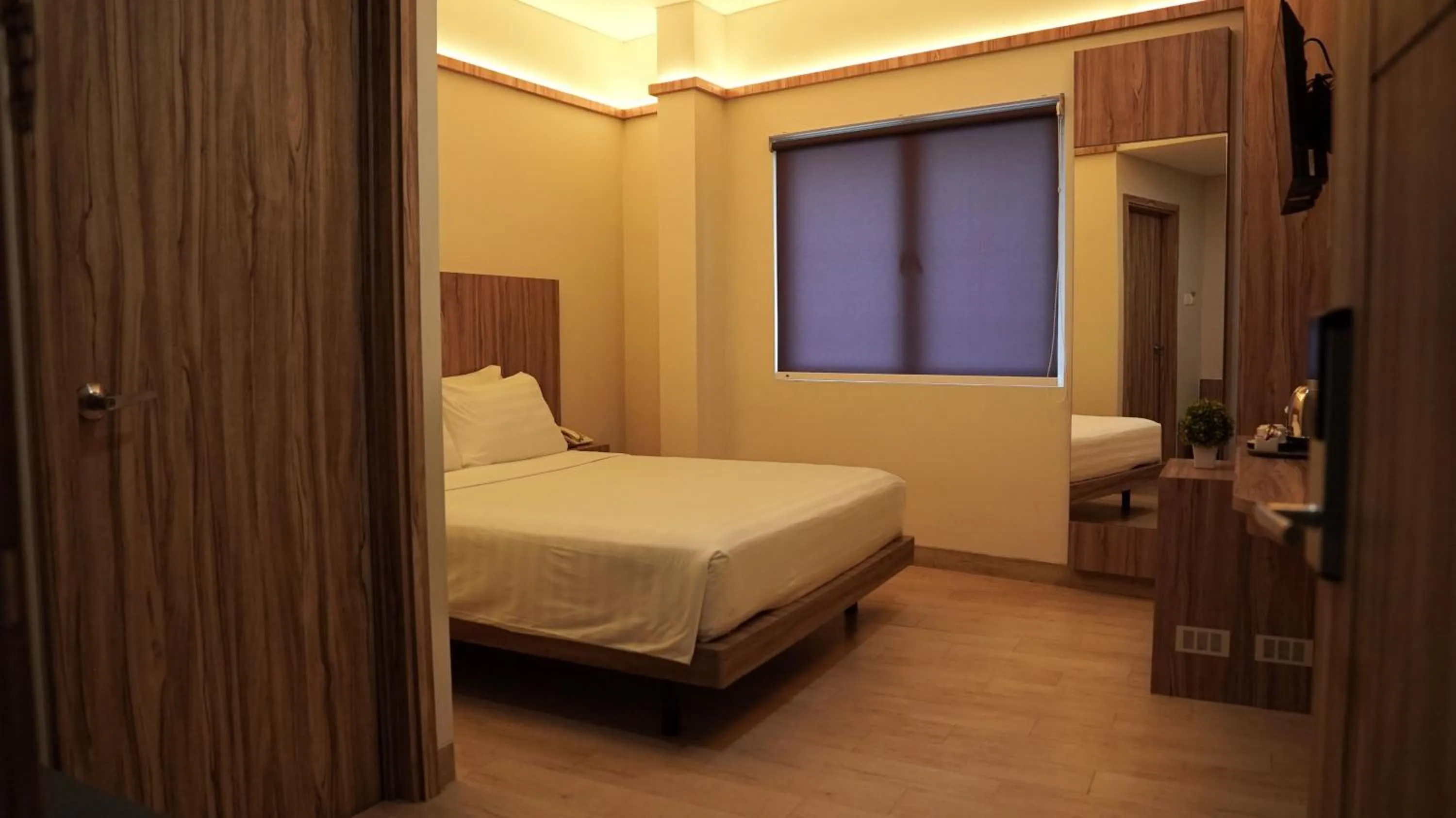Bed in Hotel Cikini