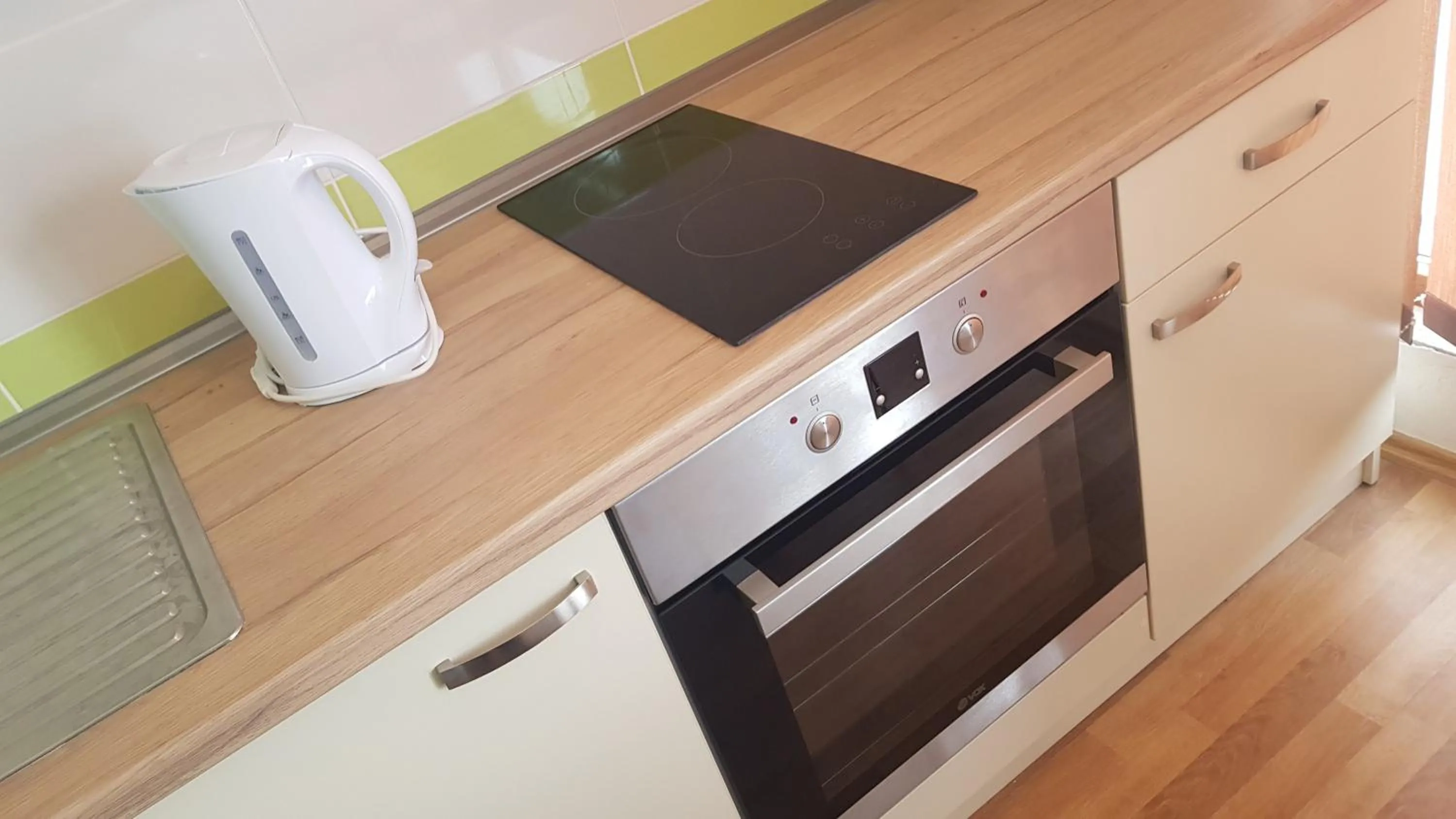 Kitchen or kitchenette in Apartments Vlašić