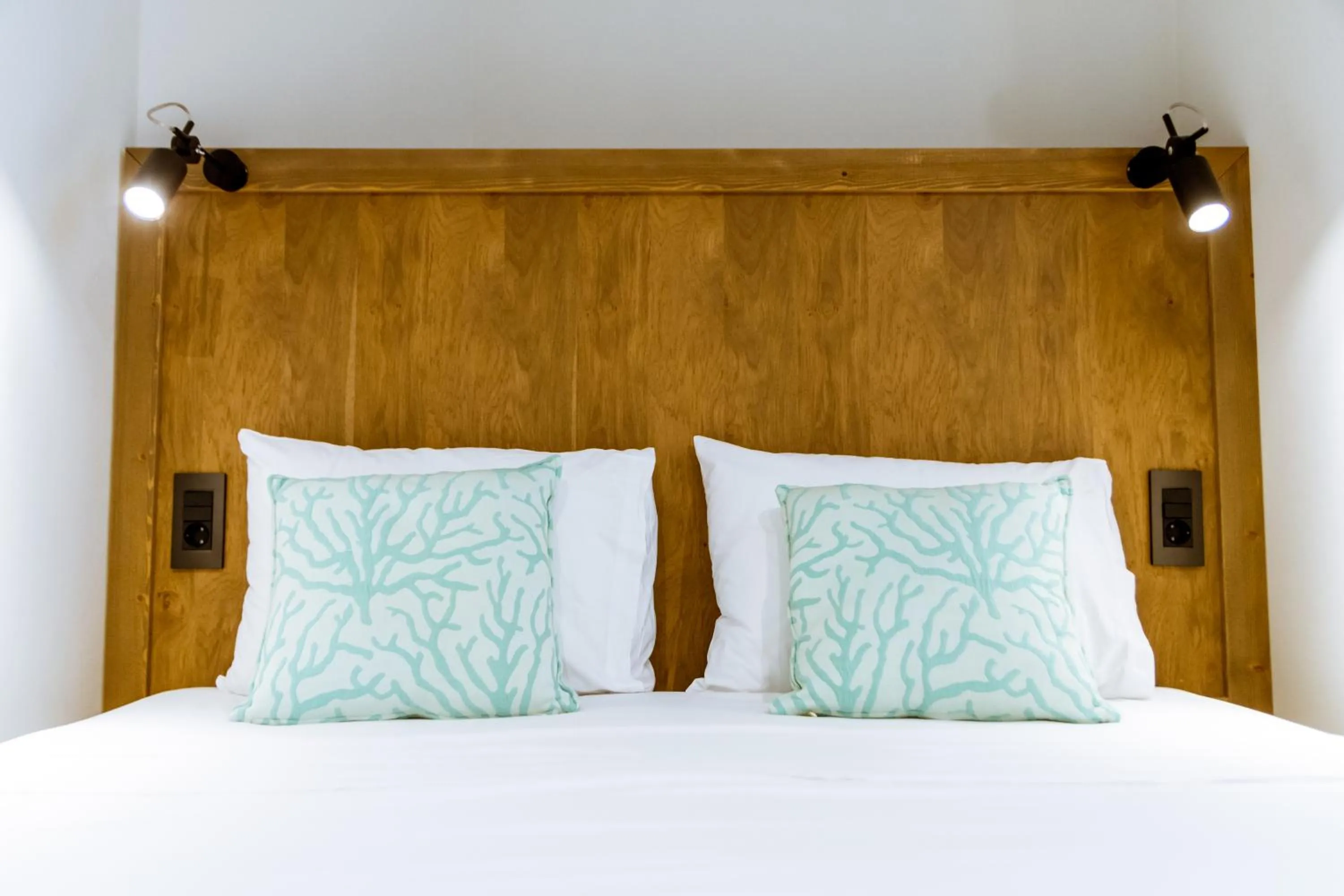 Bed in Anais Collection Hotels & Suites