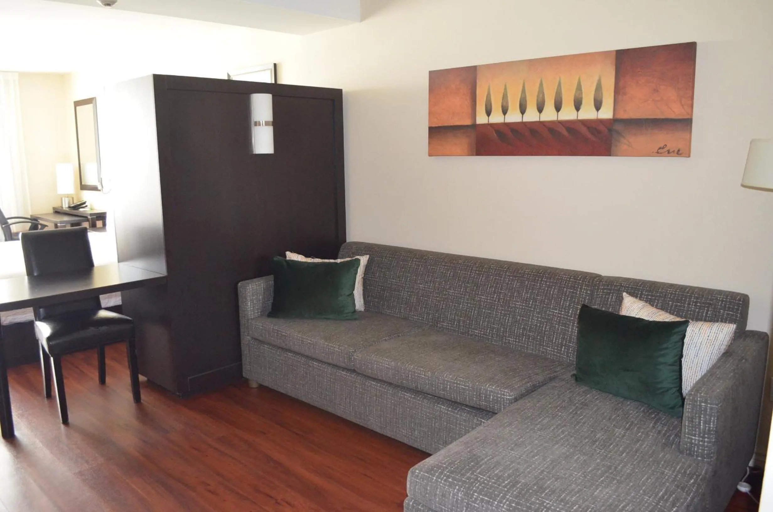 Living room in Holiday Inn & Suites Montreal Airport by IHG