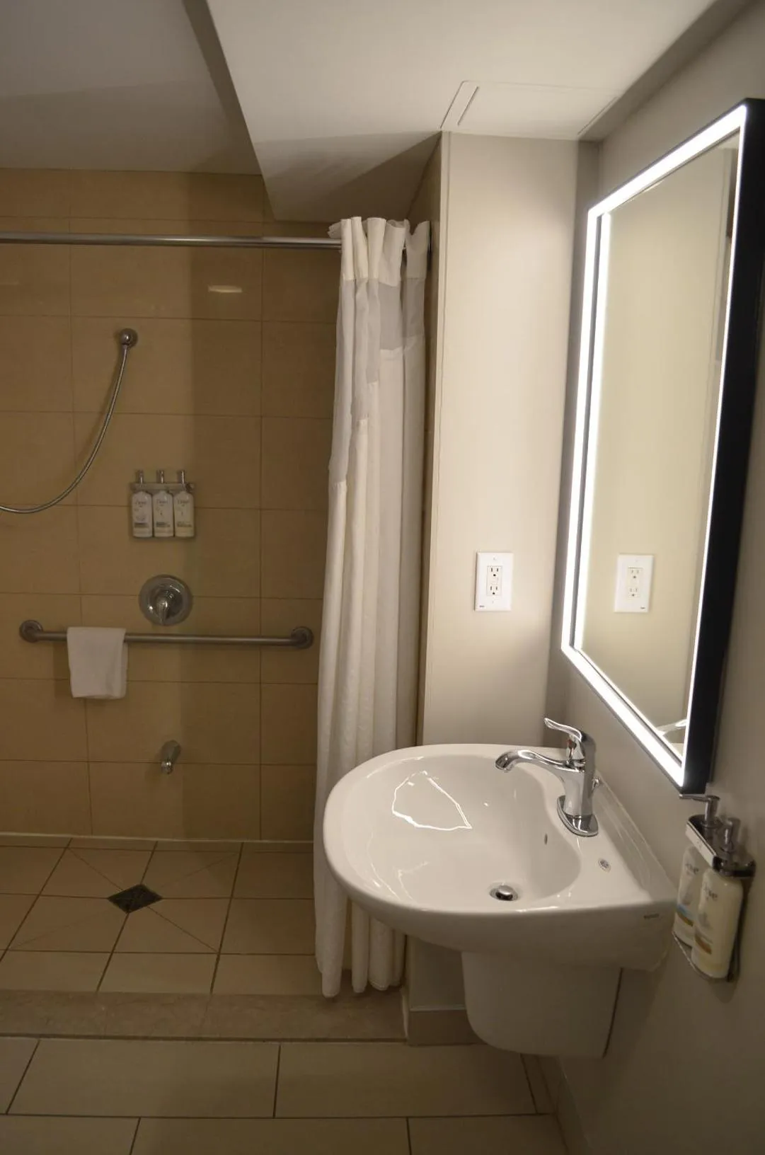 Bathroom in Holiday Inn & Suites Montreal Airport by IHG