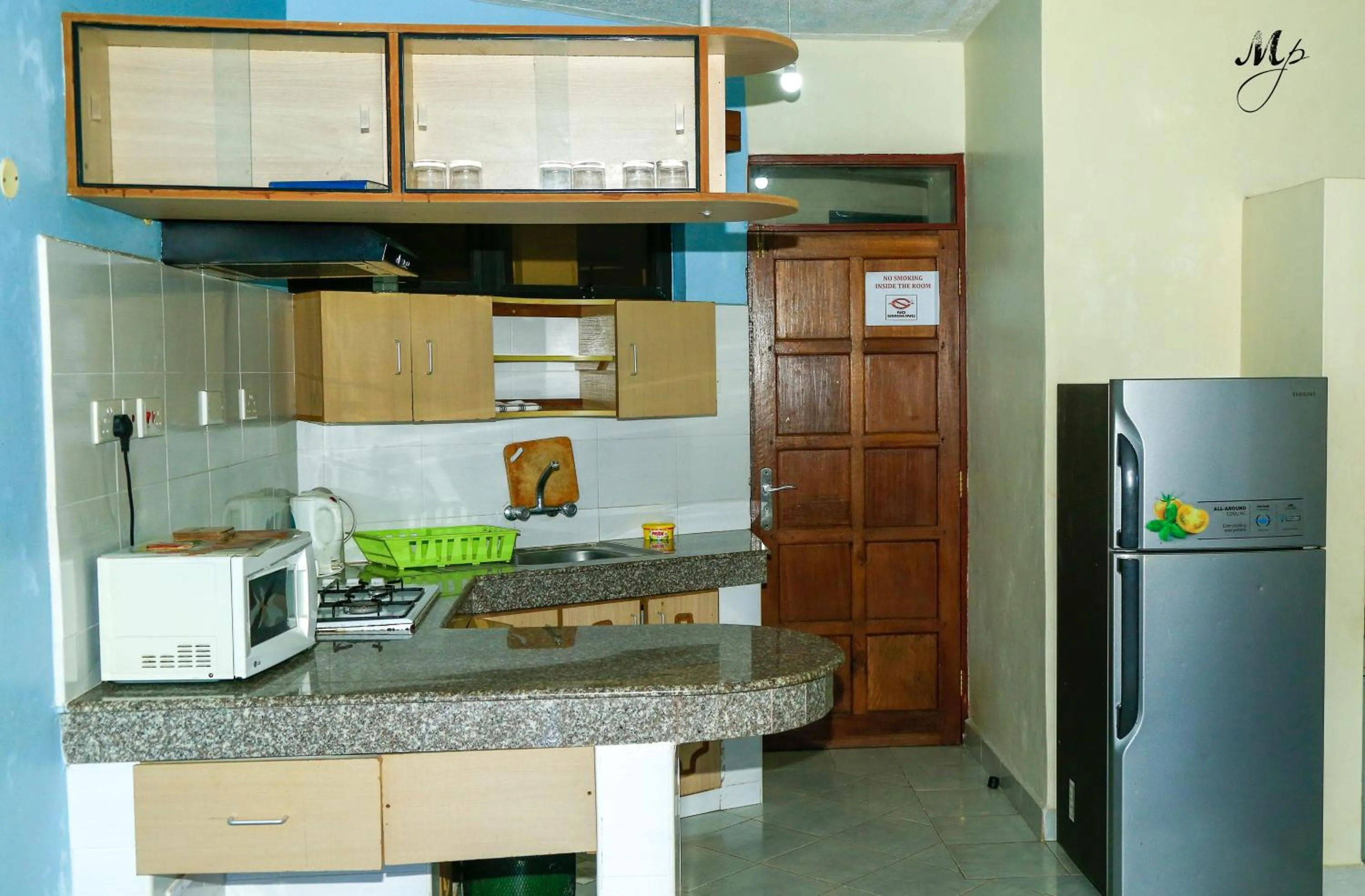 Kitchen or kitchenette in Mei Place Apartments